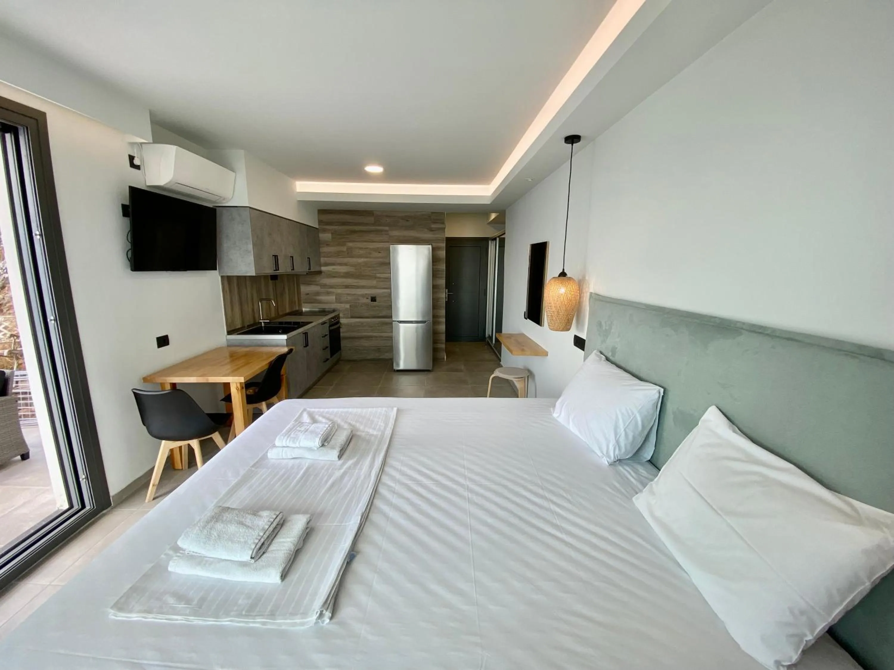 Bed in Ostria Apartments