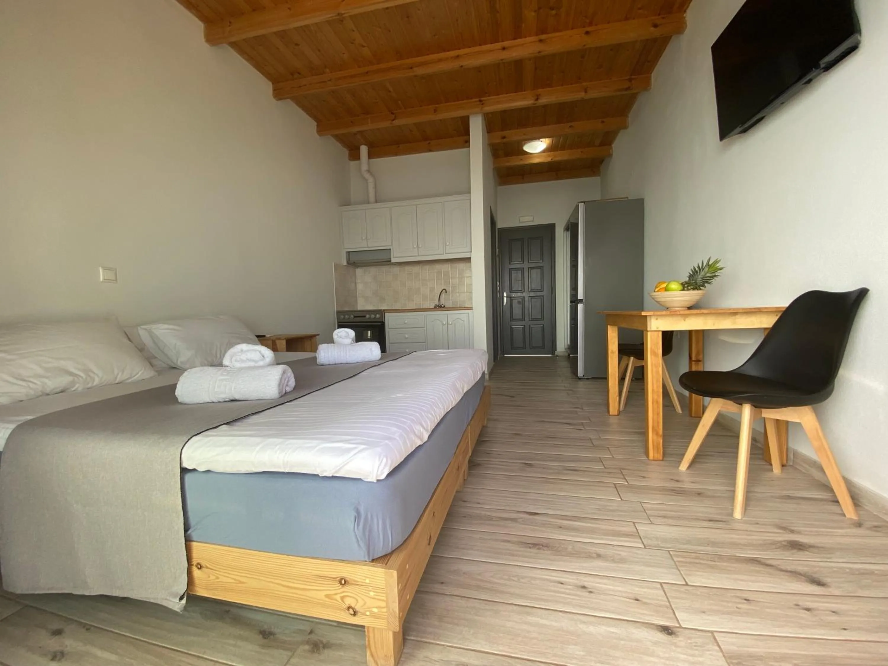 Bed in Ostria Apartments