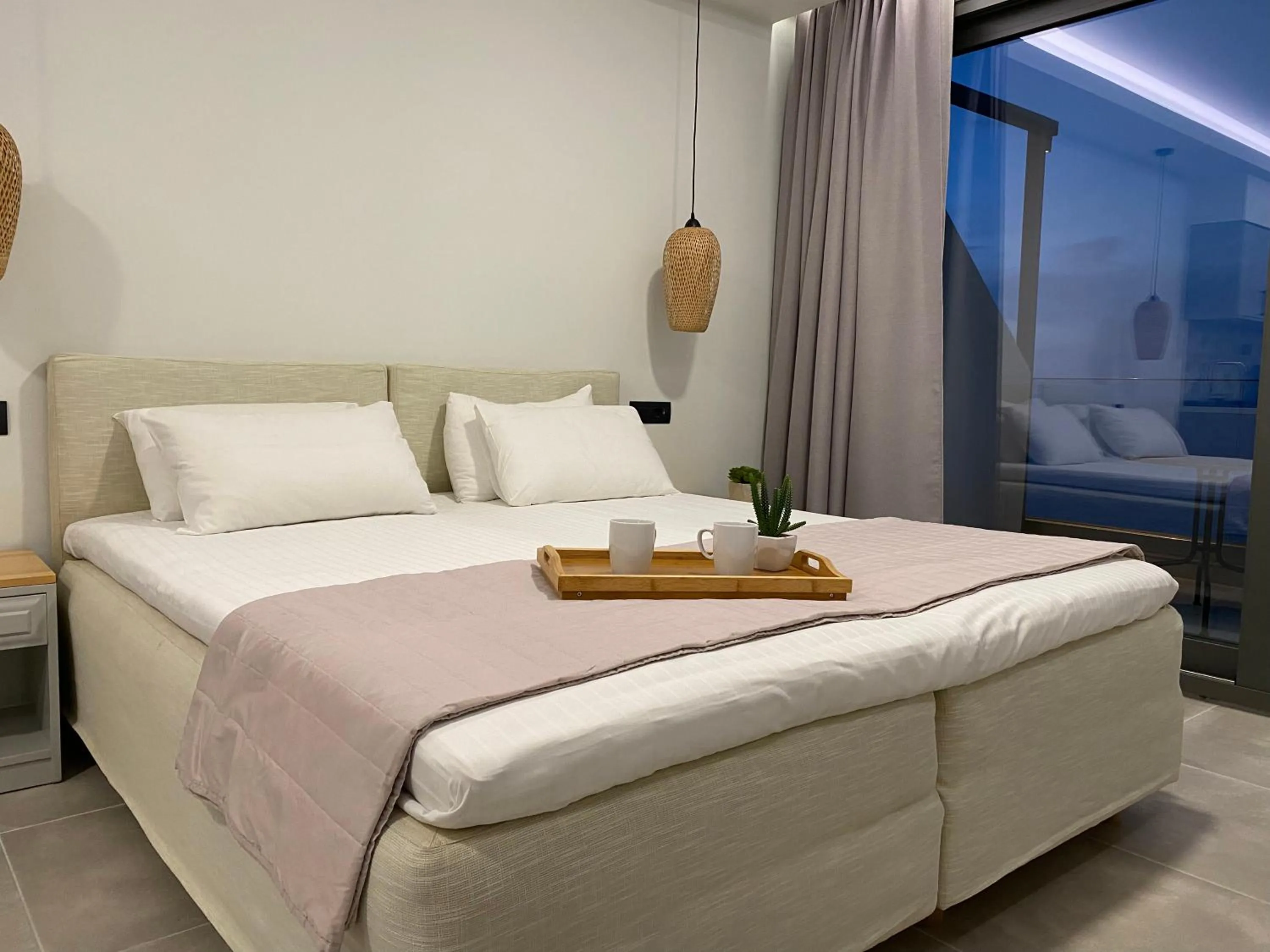 Bed in Ostria Apartments