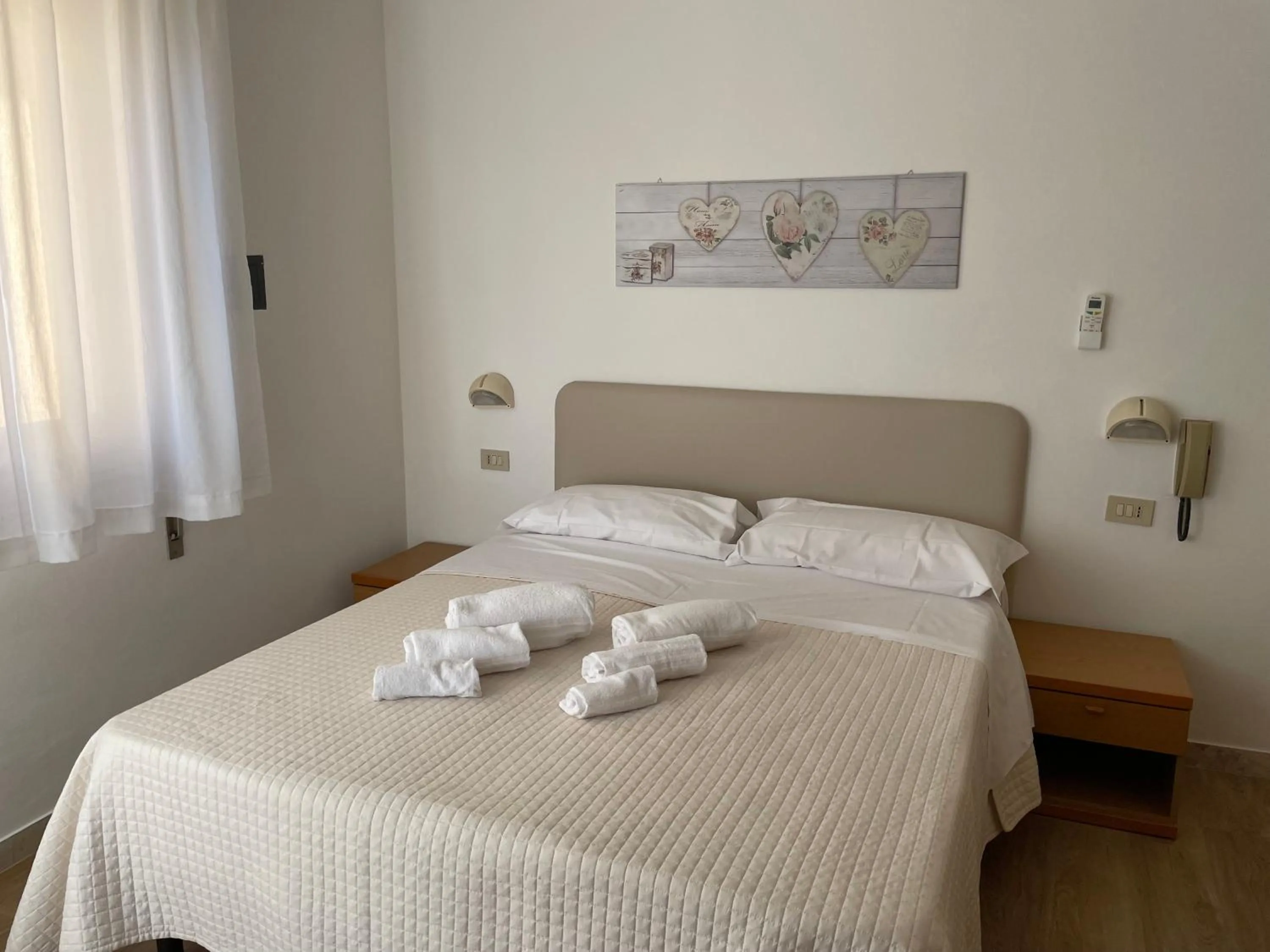 Bed in Hotel Barbiani