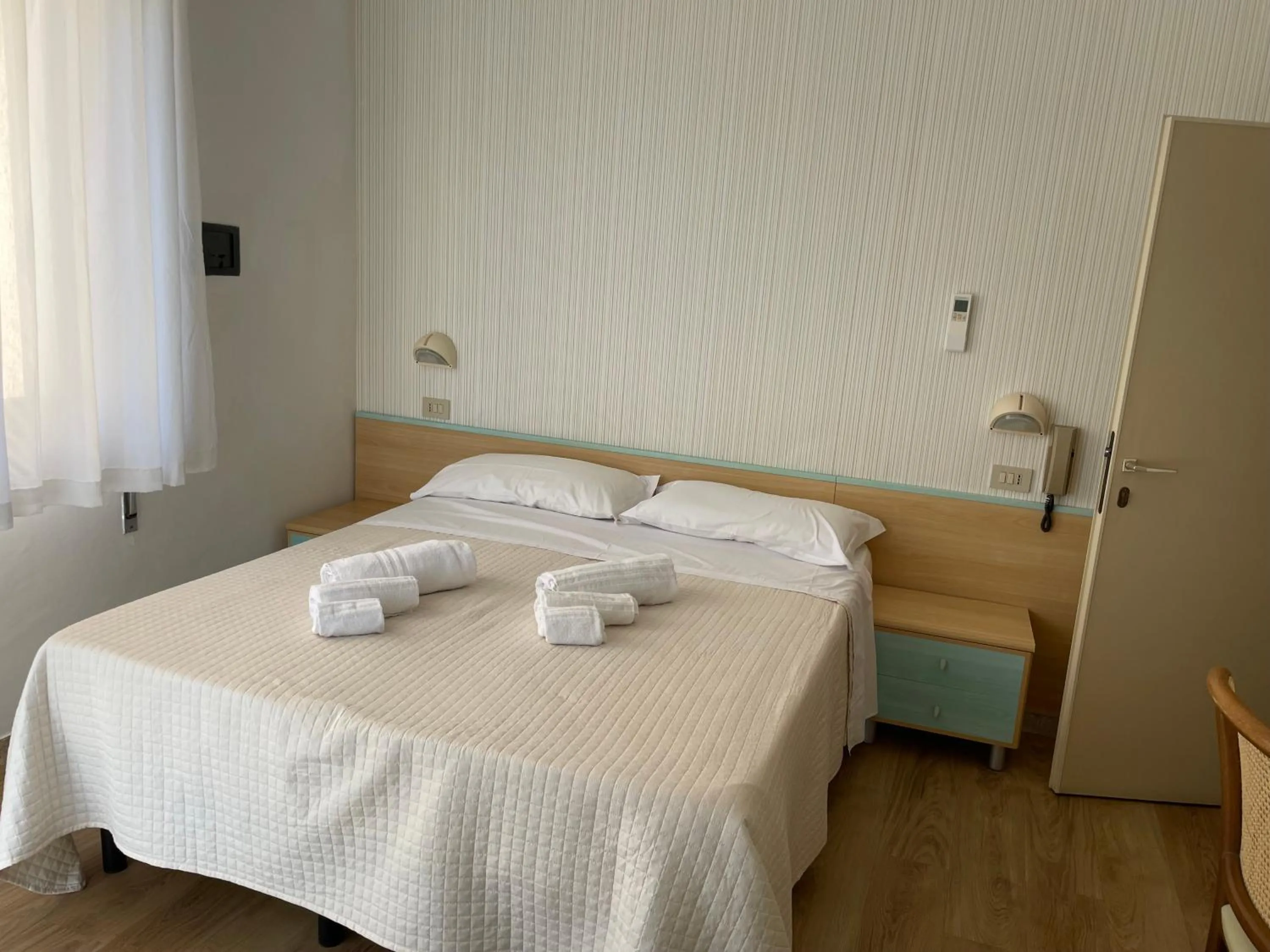 Bed in Hotel Barbiani