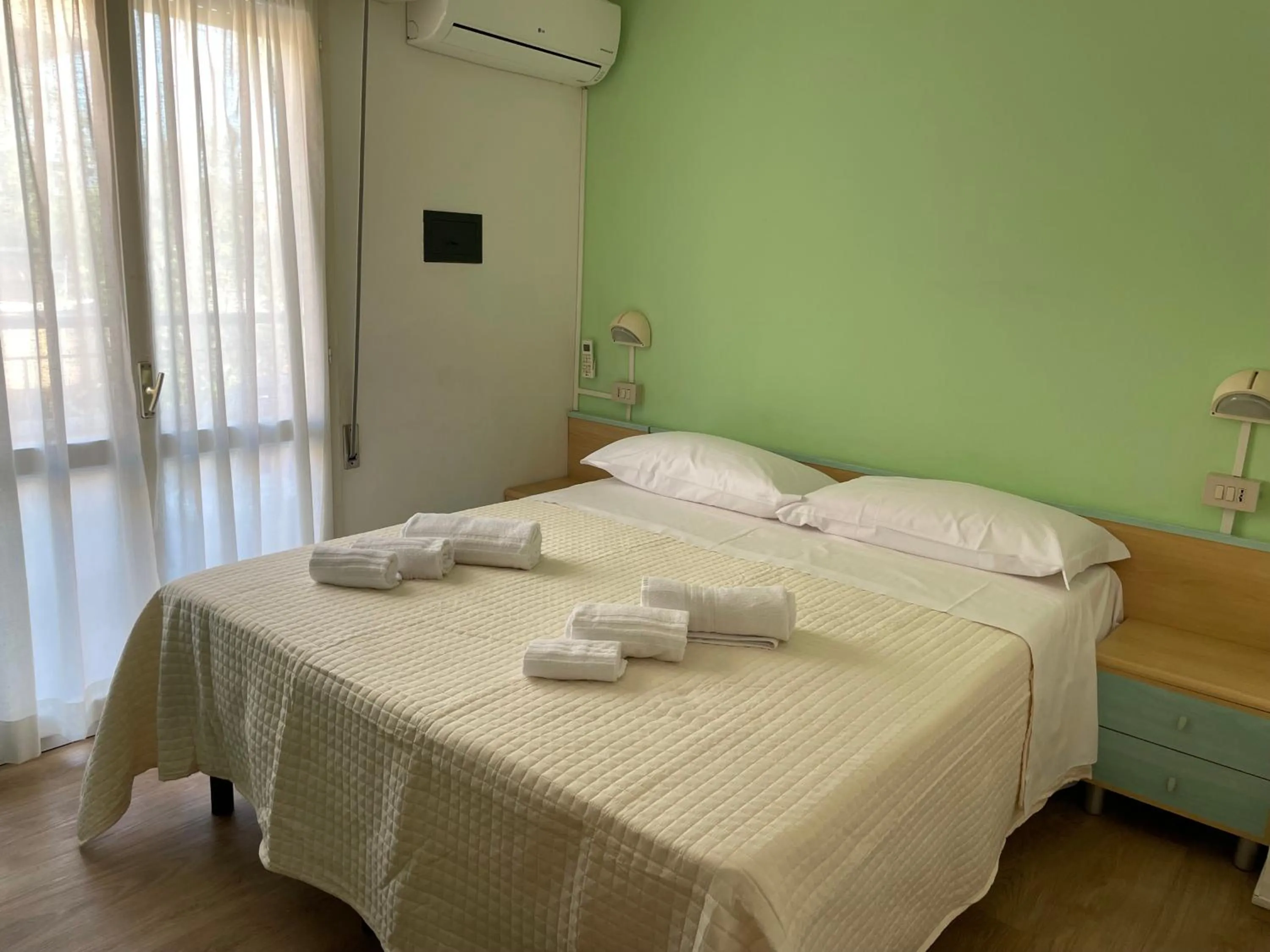 Bed in Hotel Barbiani