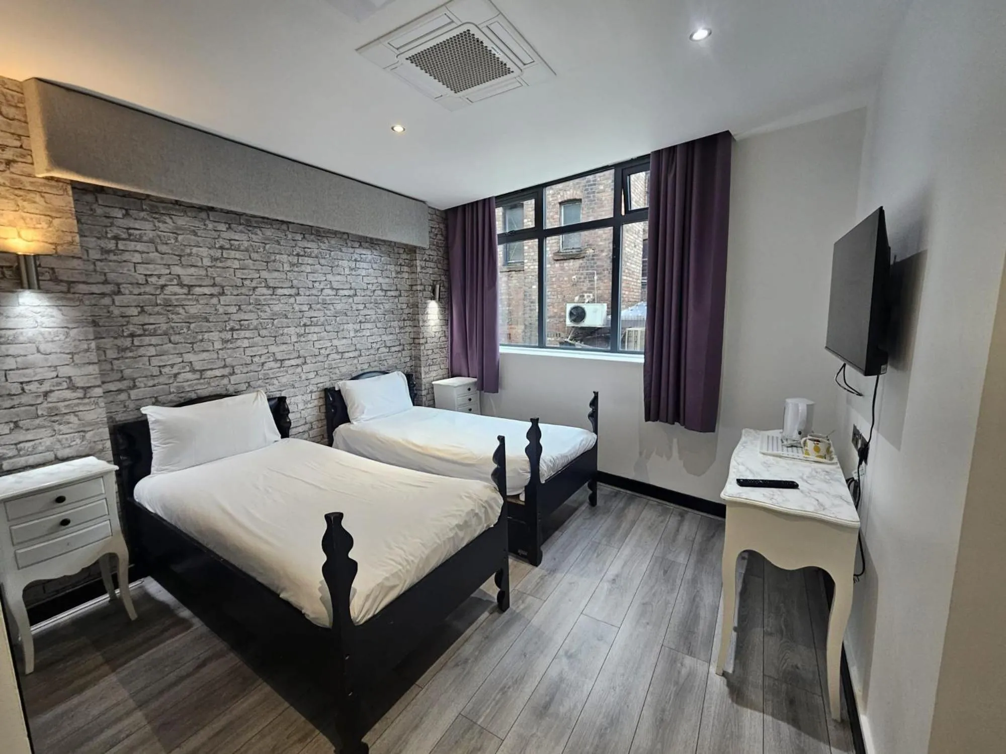 Bed in Print Works Hotel