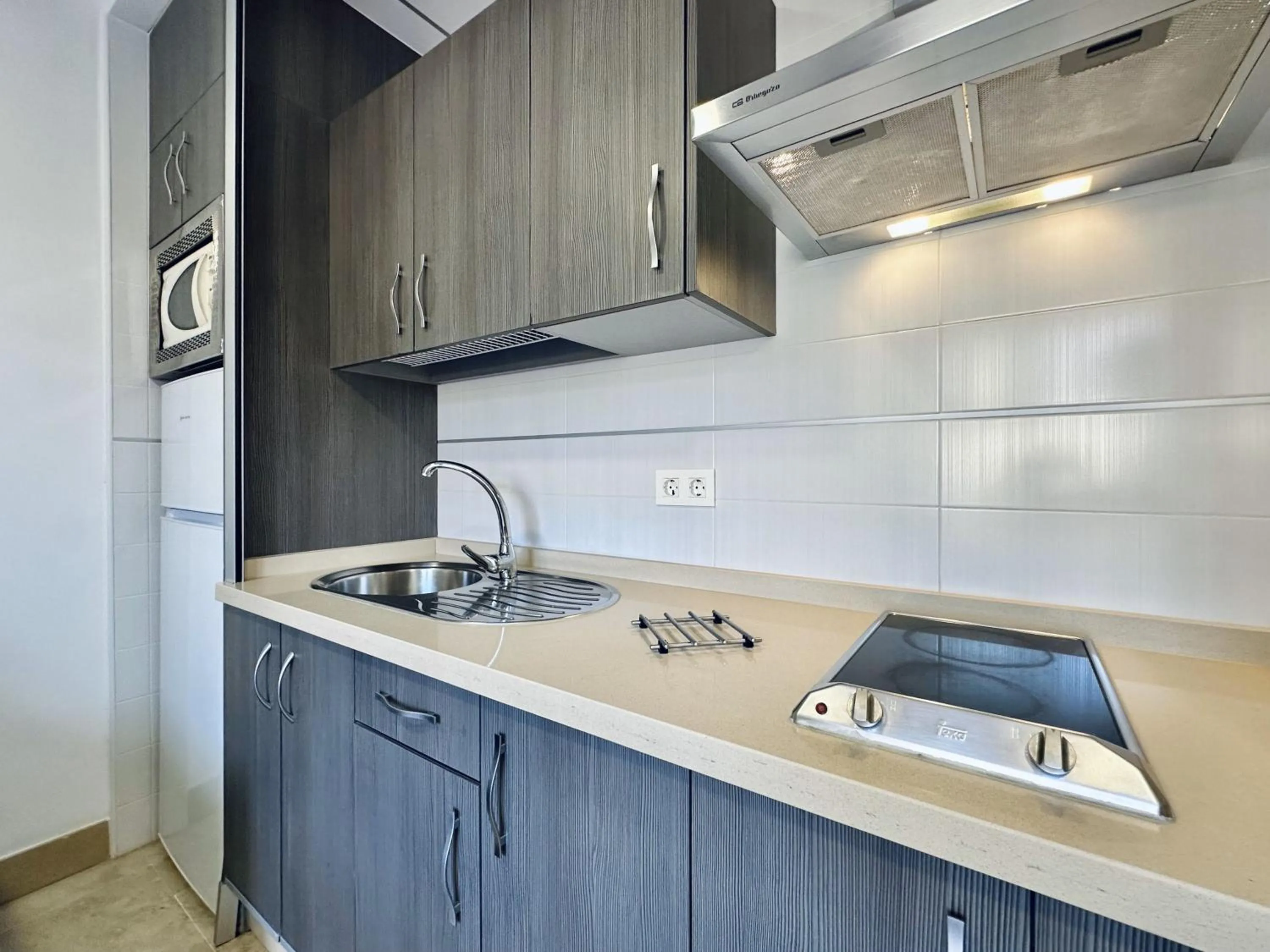 Kitchen or kitchenette in Hotel Apartamentos Marina Luz