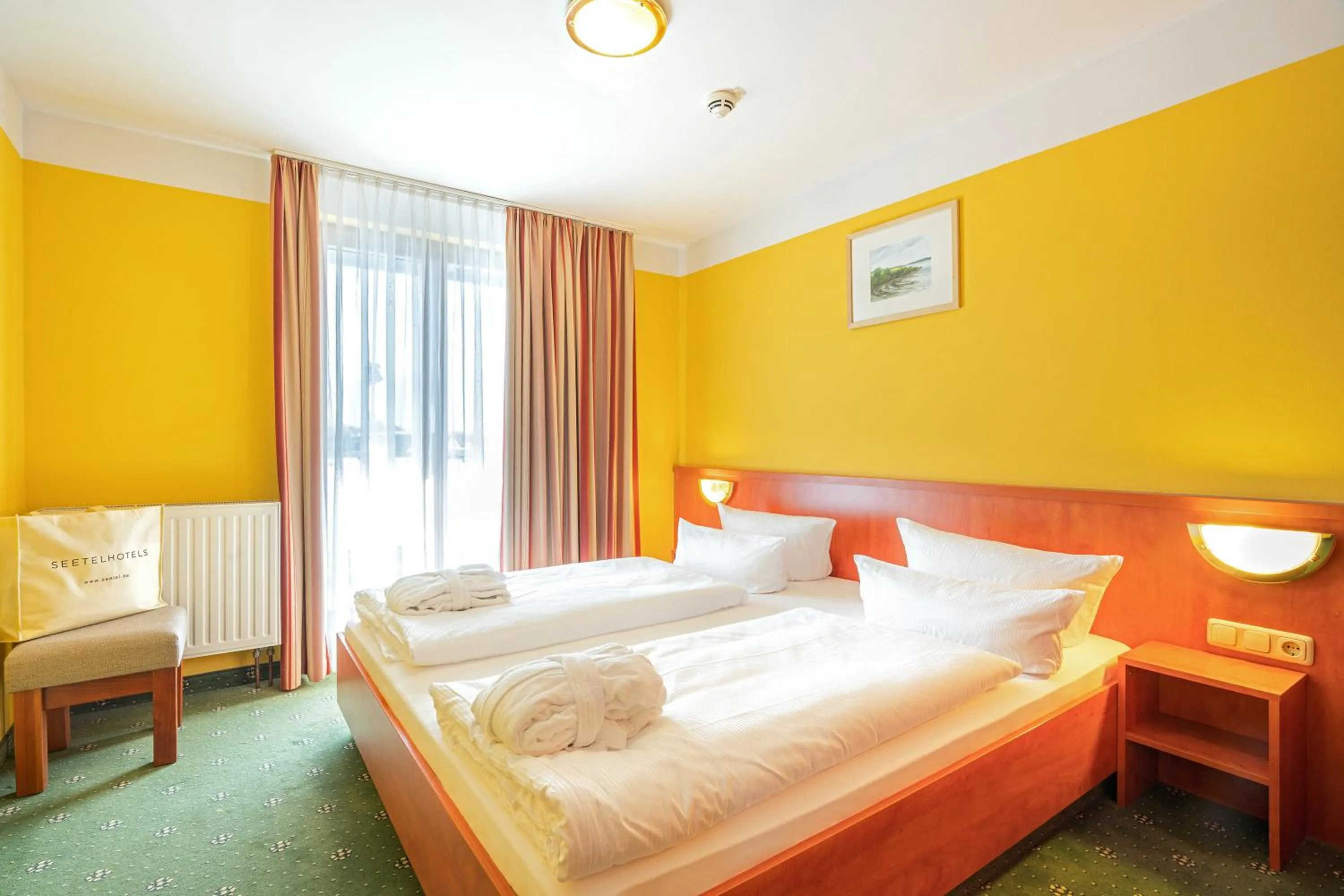 Photo of the whole room, Bed in SEETELHOTEL Nautic Usedom Hotel & Spa das Hotel für Wellness & Genuss auf Usedom