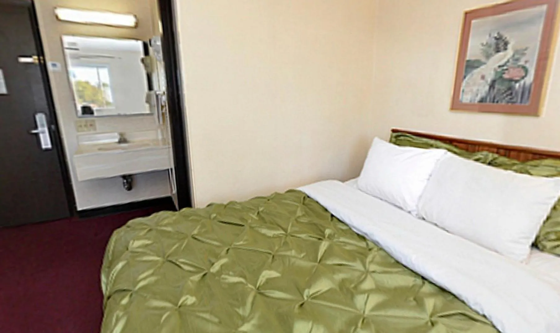 Decorative detail, Bed in Extended Stay Warrenton Inn