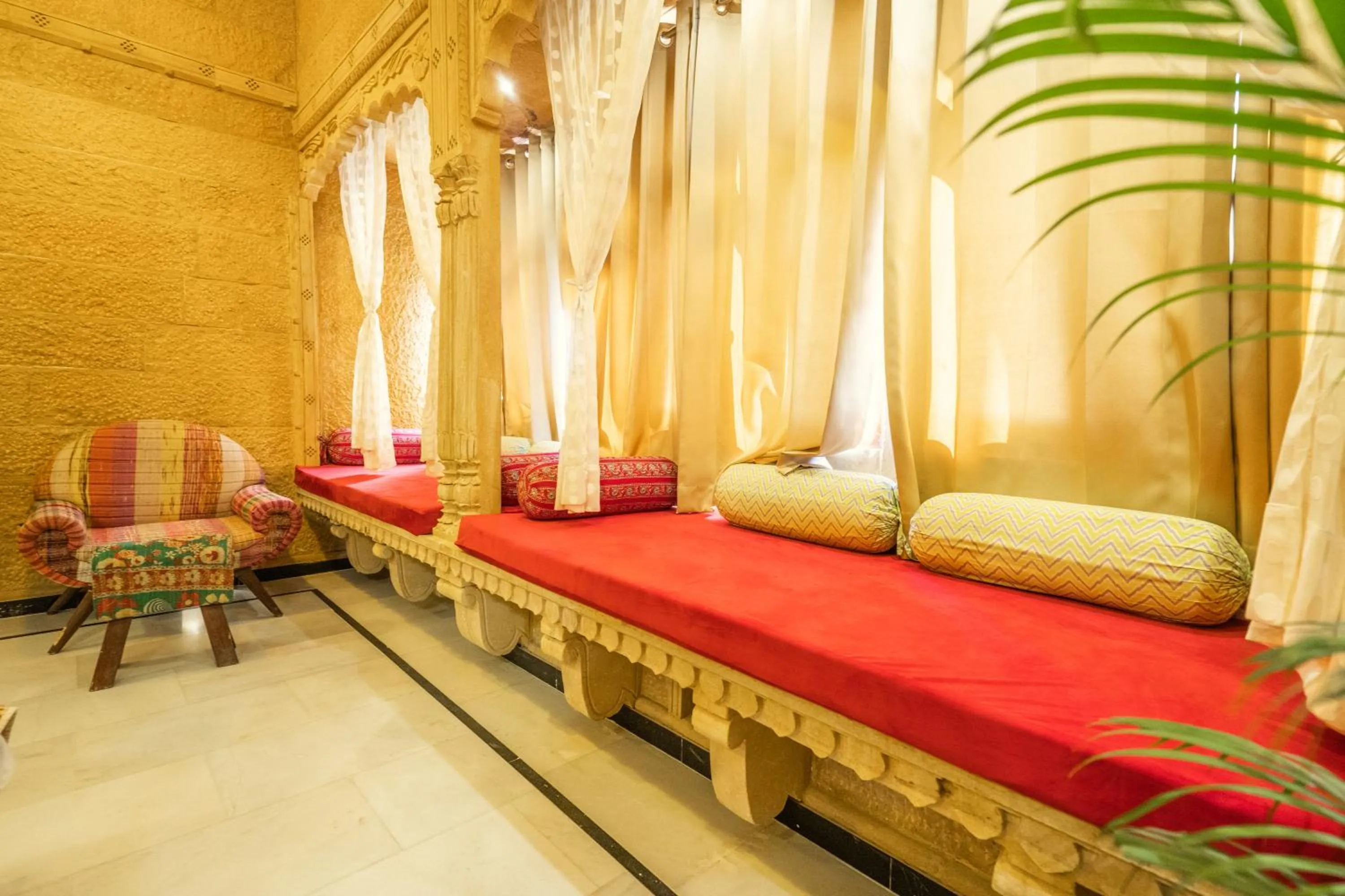 Seating area, Bed in Garh Meera - A Sensational Boutique Hotel