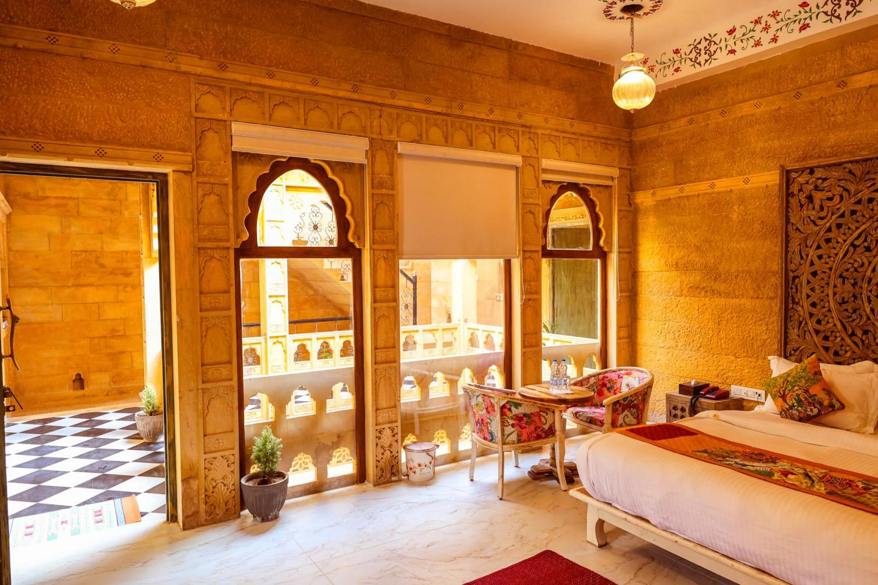 Seating area, Bed in Garh Meera - A Sensational Boutique Hotel