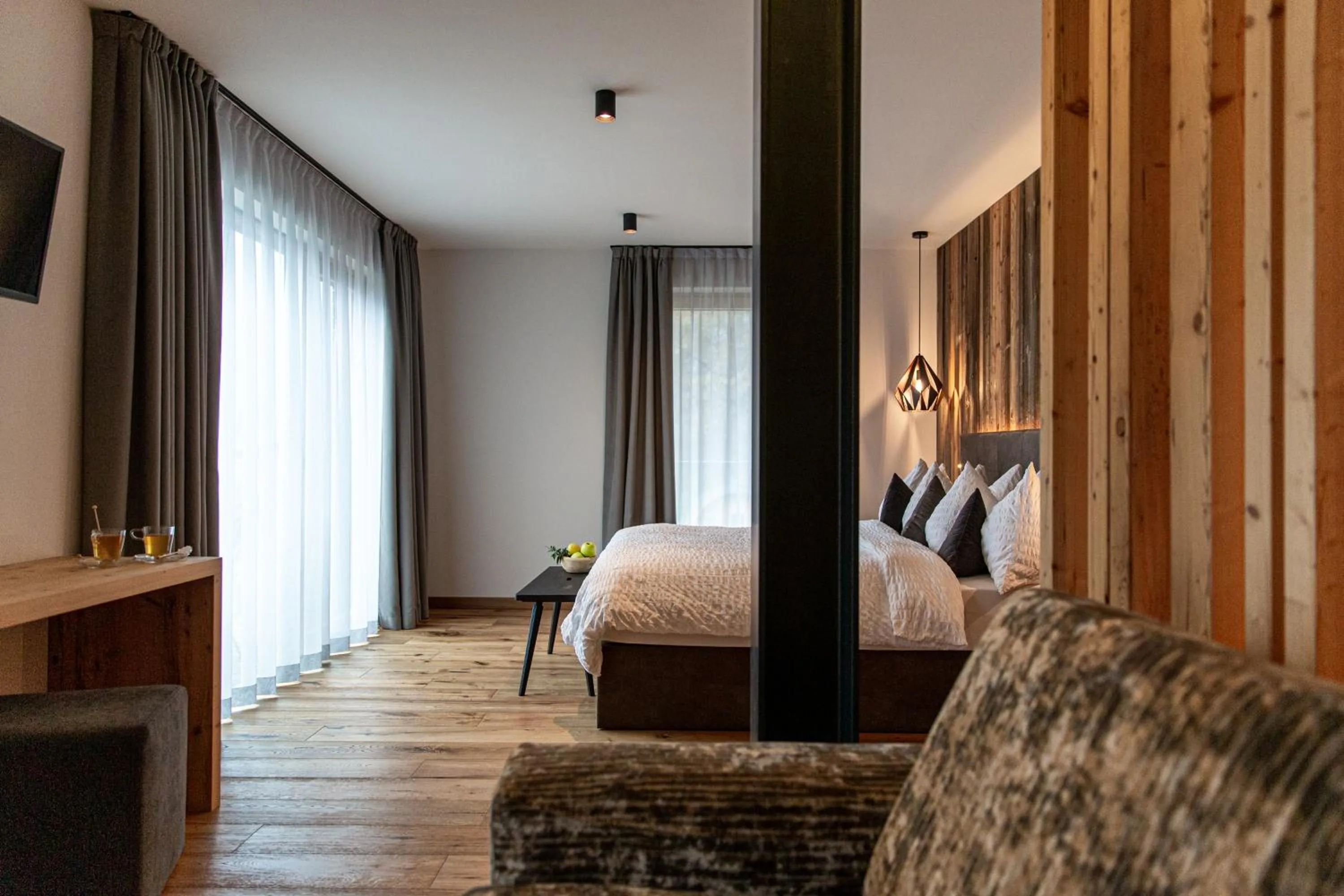 Bed in Alpotel Dolomiten