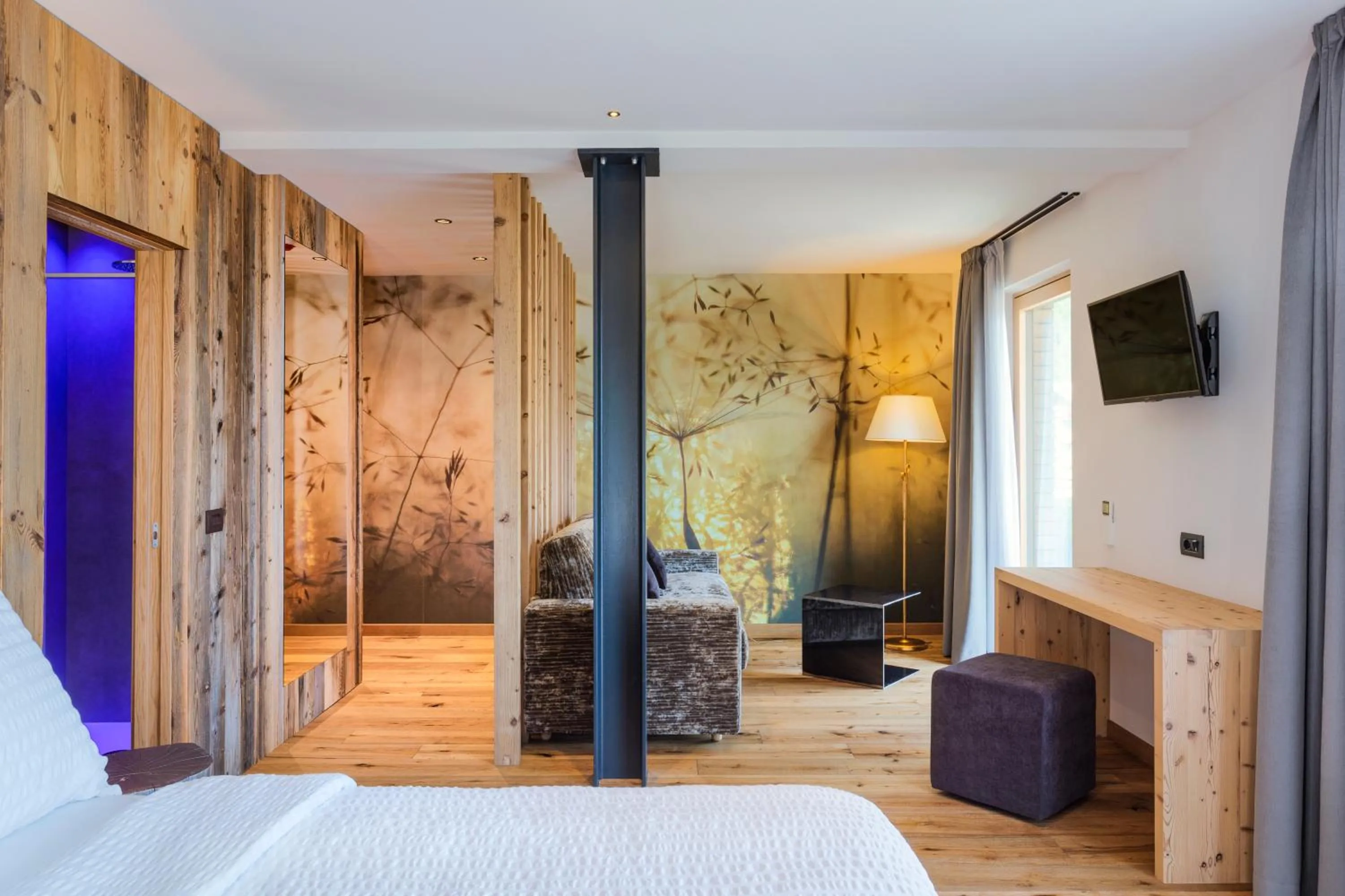 Bed in Alpotel Dolomiten