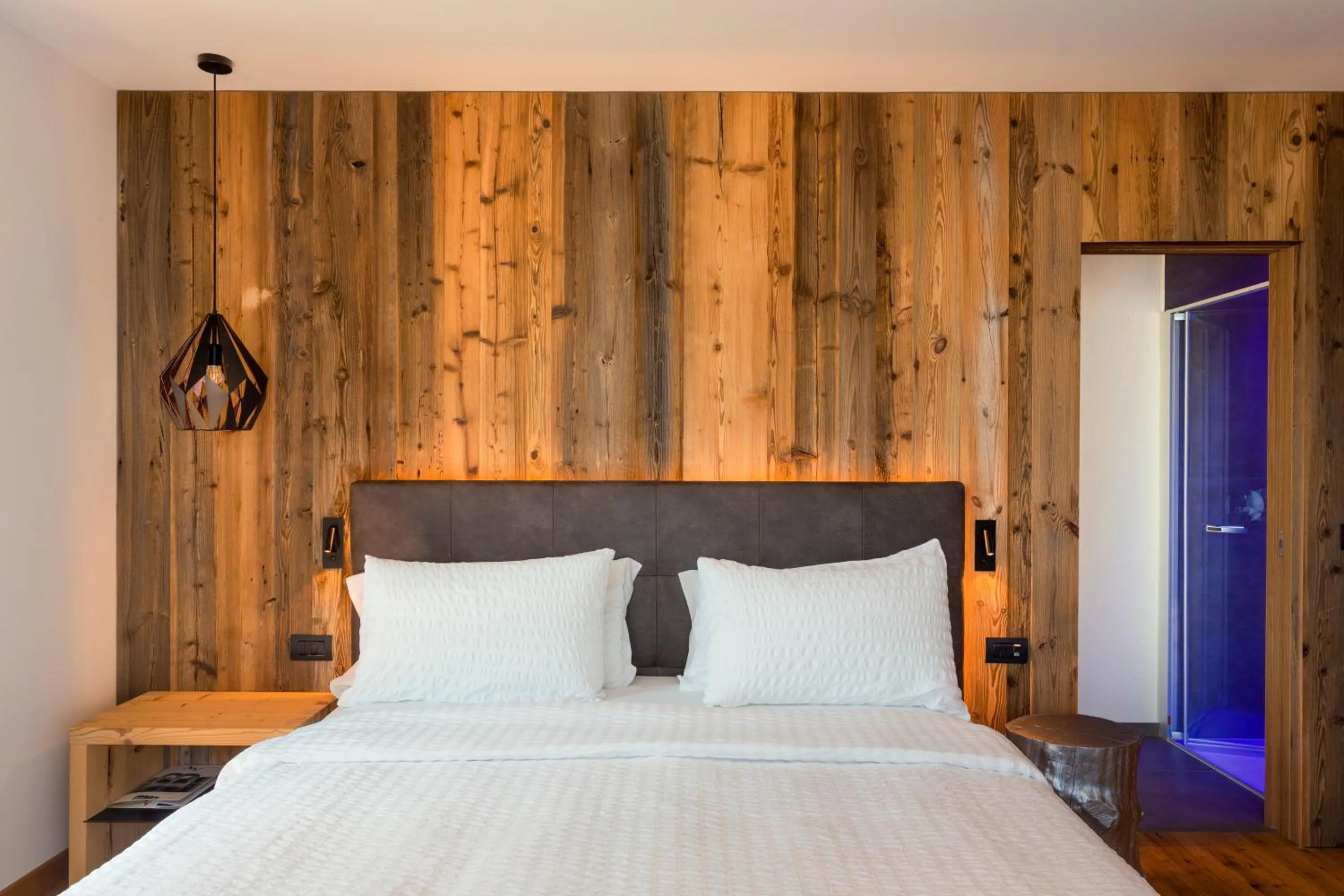 Bed in Alpotel Dolomiten