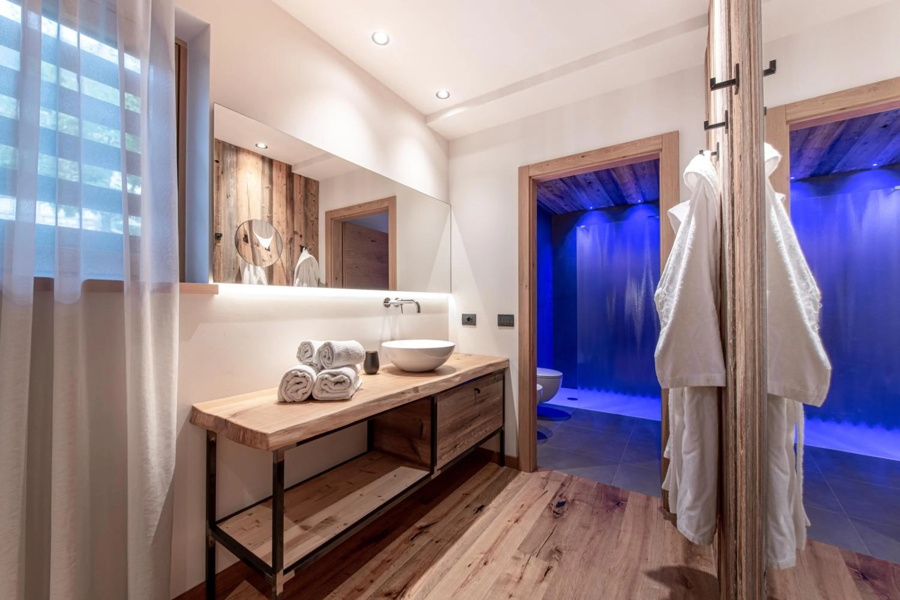 Bed in Alpotel Dolomiten