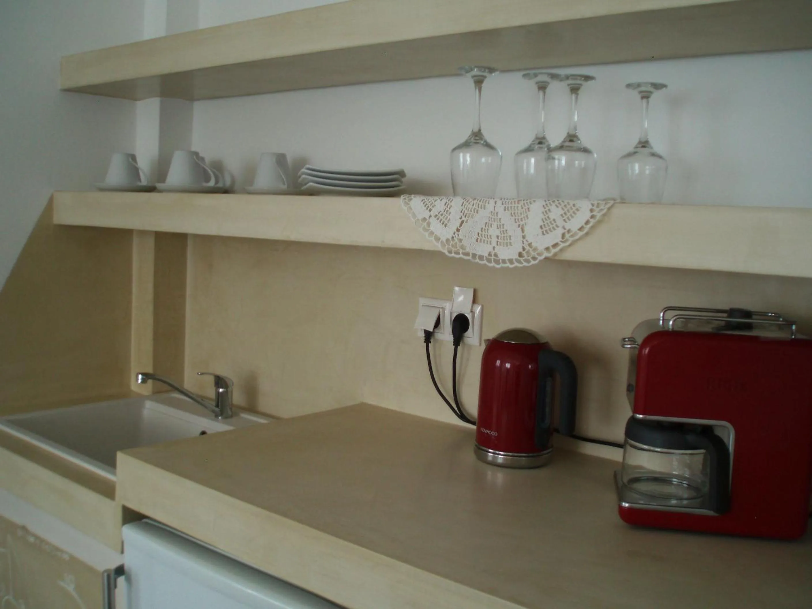 Kitchen or kitchenette in Scorpios Hotel & Suites