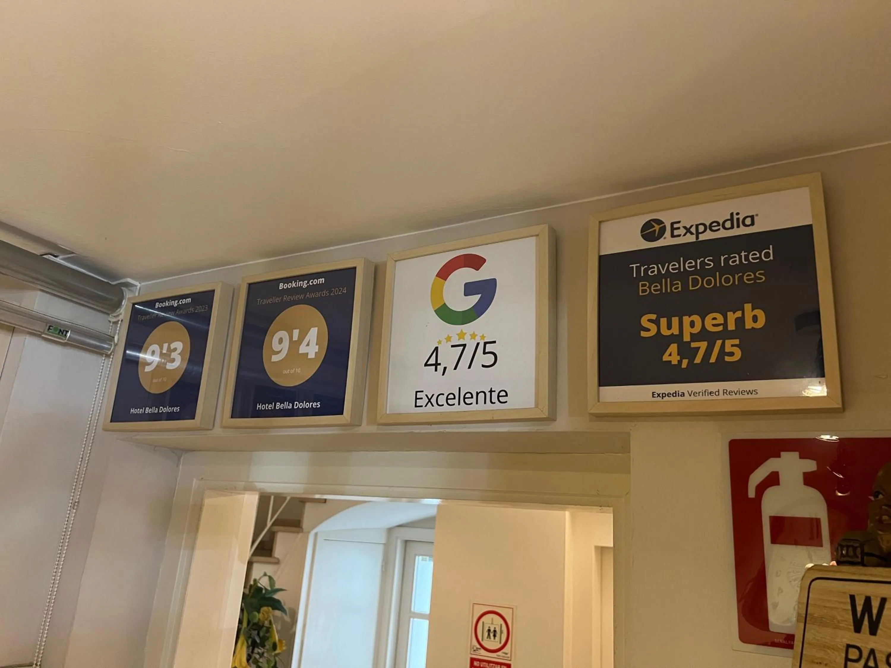 Property logo or sign in Hotel Bella Dolores