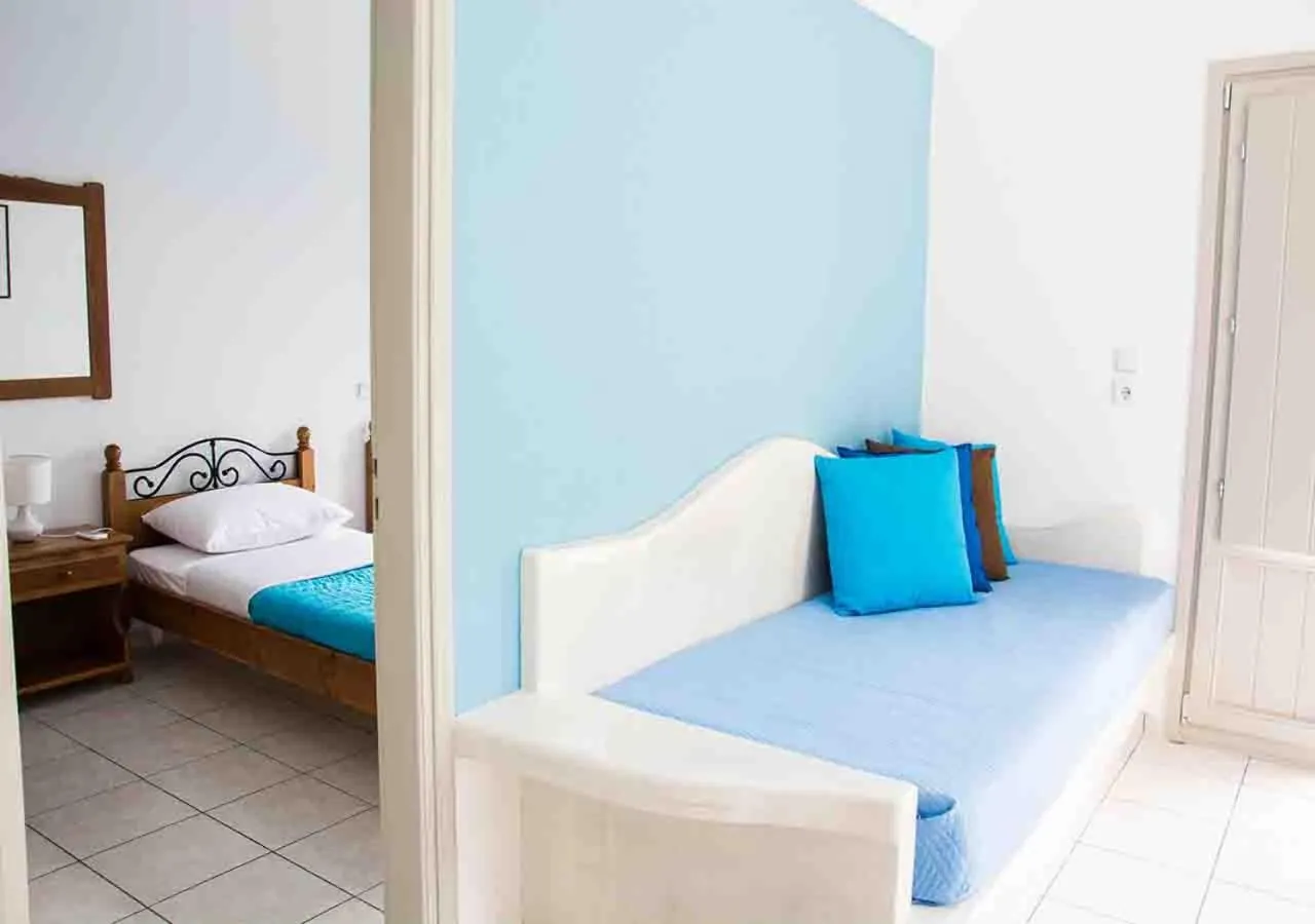 Bed in Sail Inn Studios & Apartments