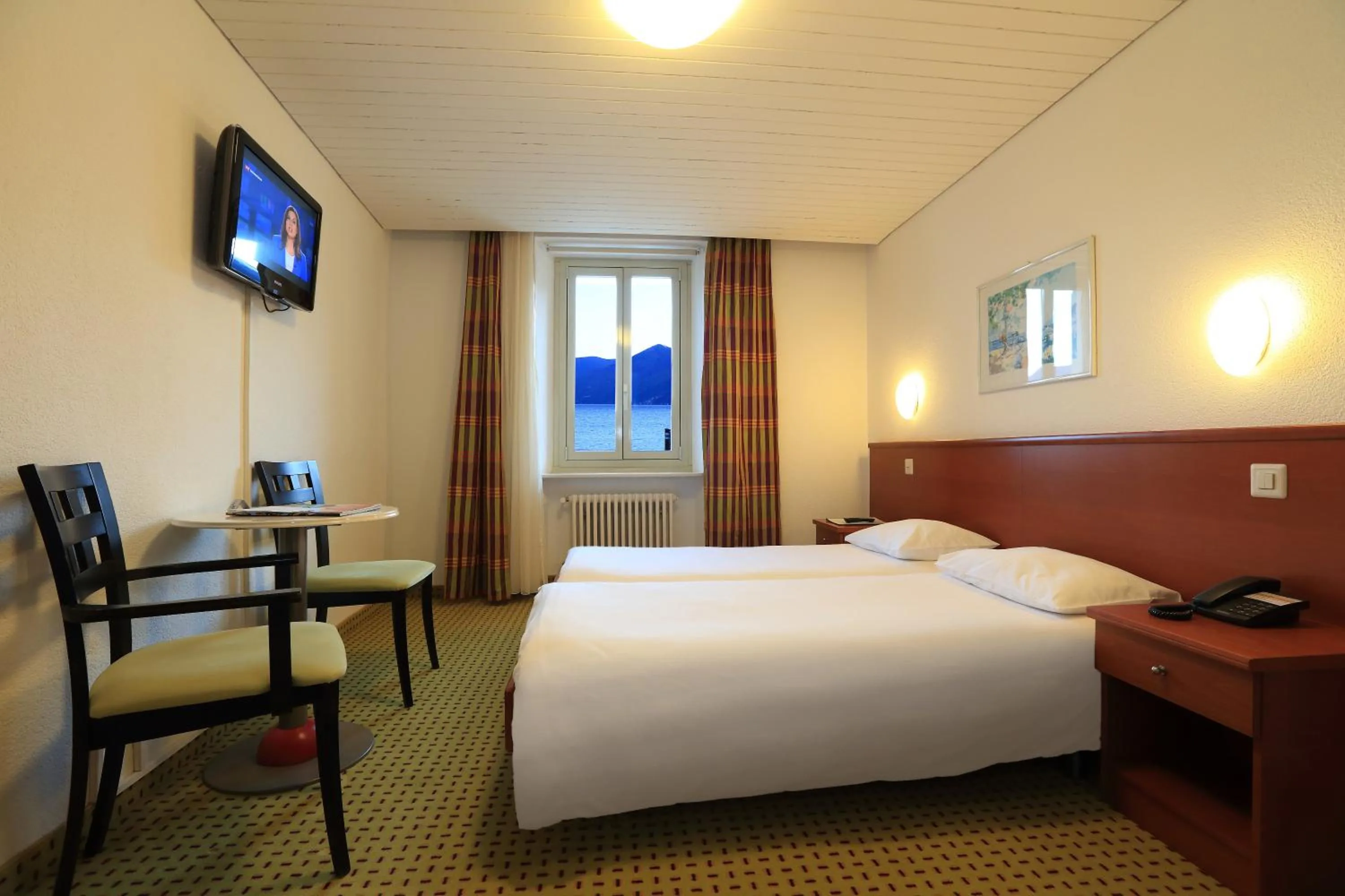 Photo of the whole room, Bed in Piazza Ascona Hotel & Restaurants