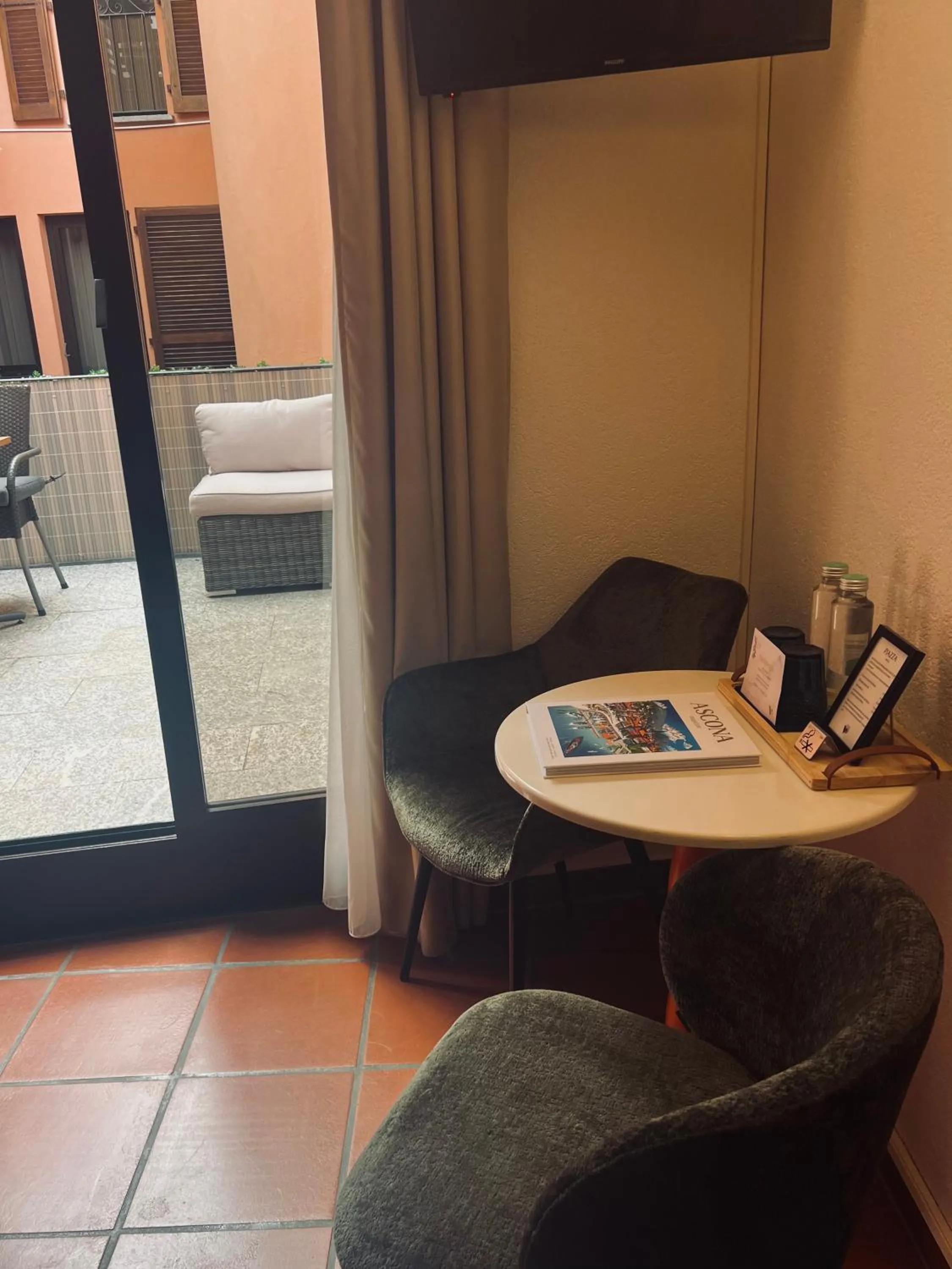 Seating area in Piazza Ascona Hotel & Restaurants