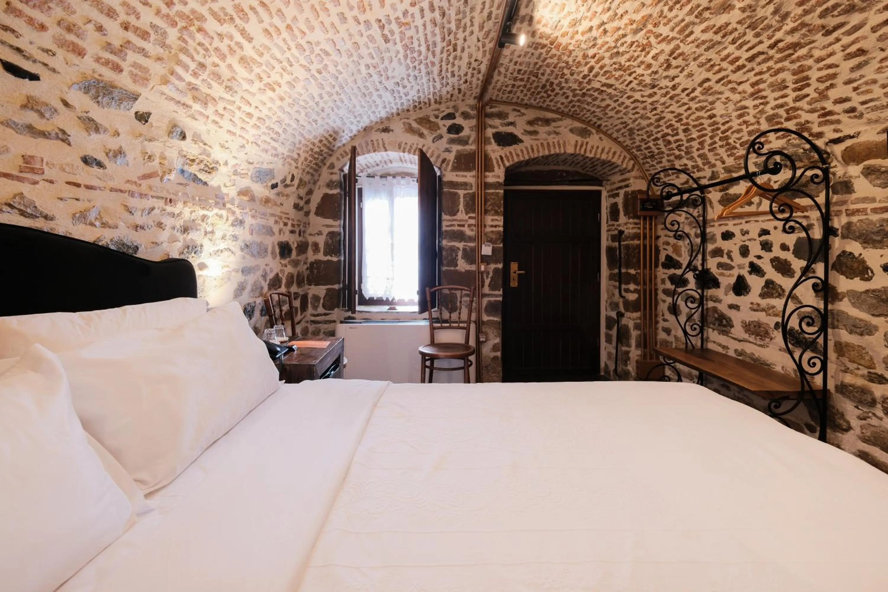 Bed in HANI I PAZARIT Boutique Hotel