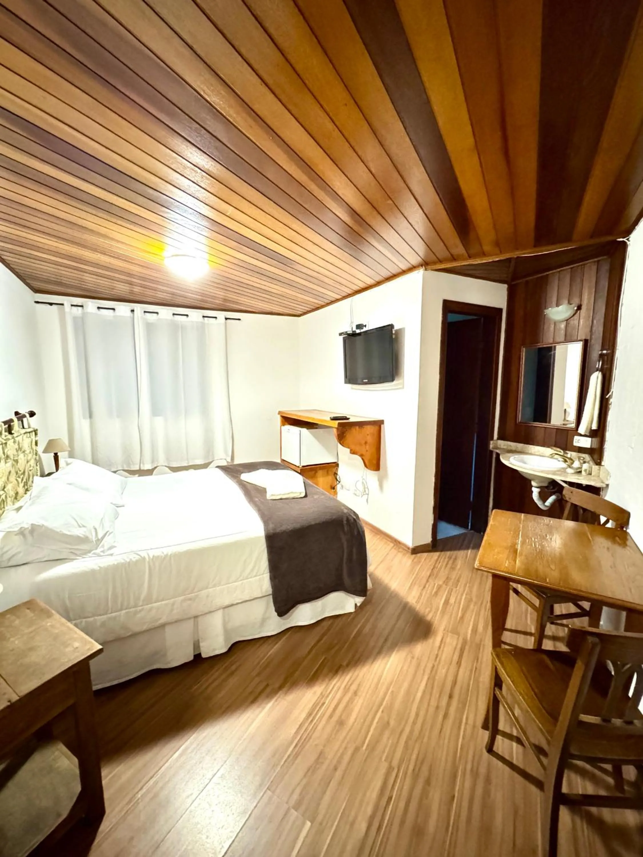 Bed in Pousada do Sino - 2 min do Capivari