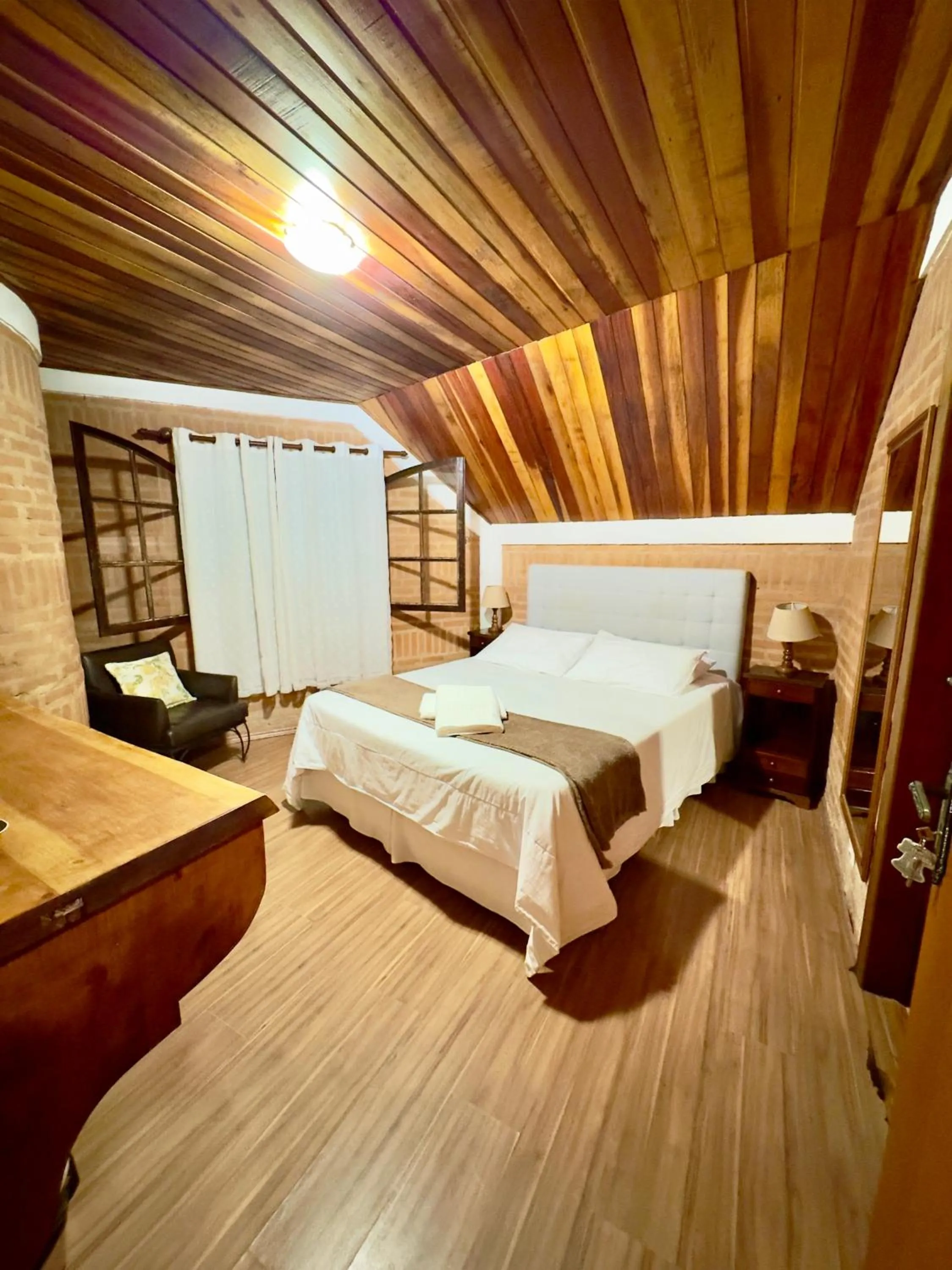 Bed in Pousada do Sino - 2 min do Capivari