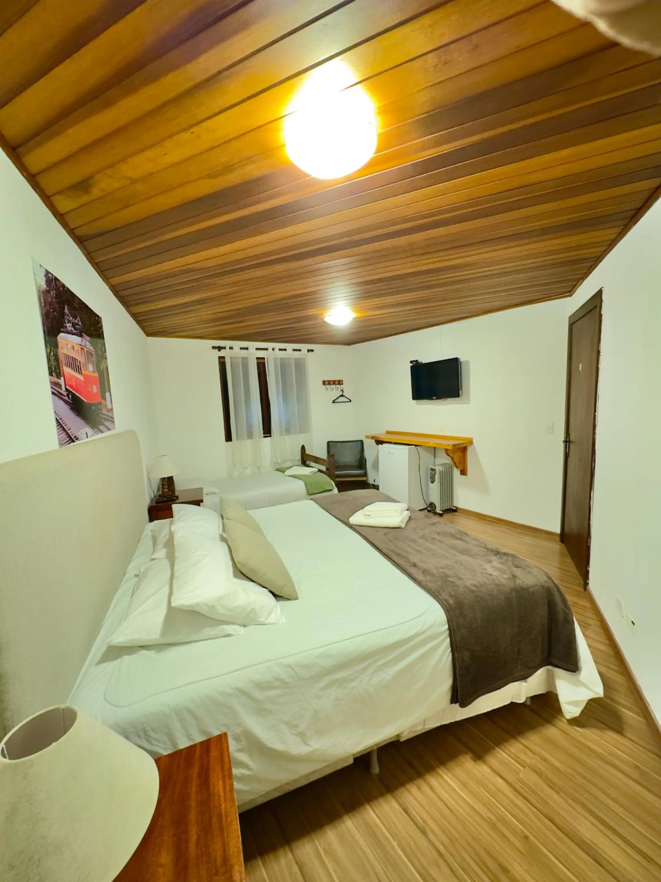 Bed in Pousada do Sino - 2 min do Capivari