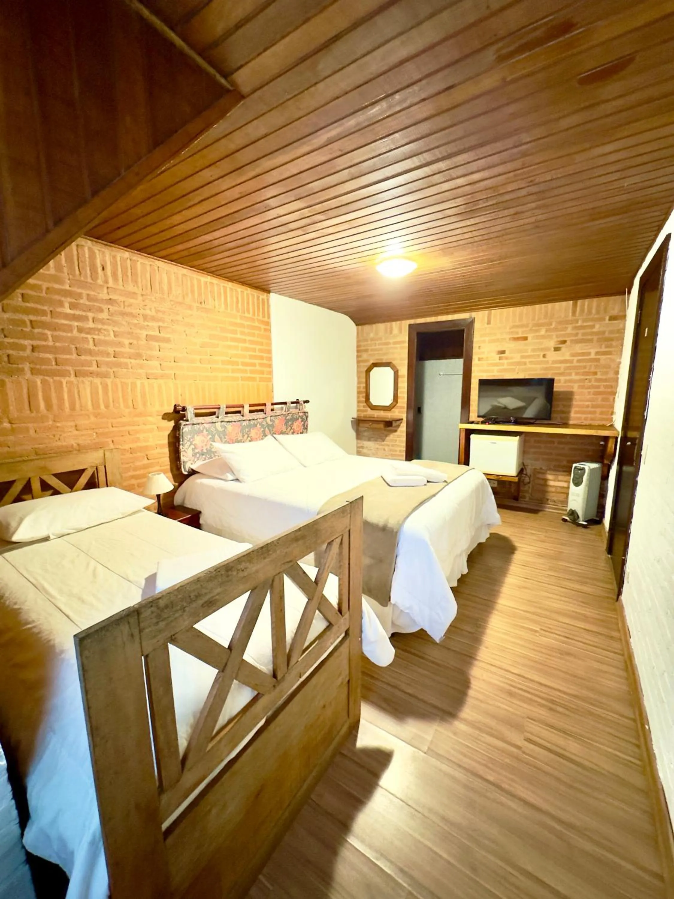 Bed in Pousada do Sino - 2 min do Capivari
