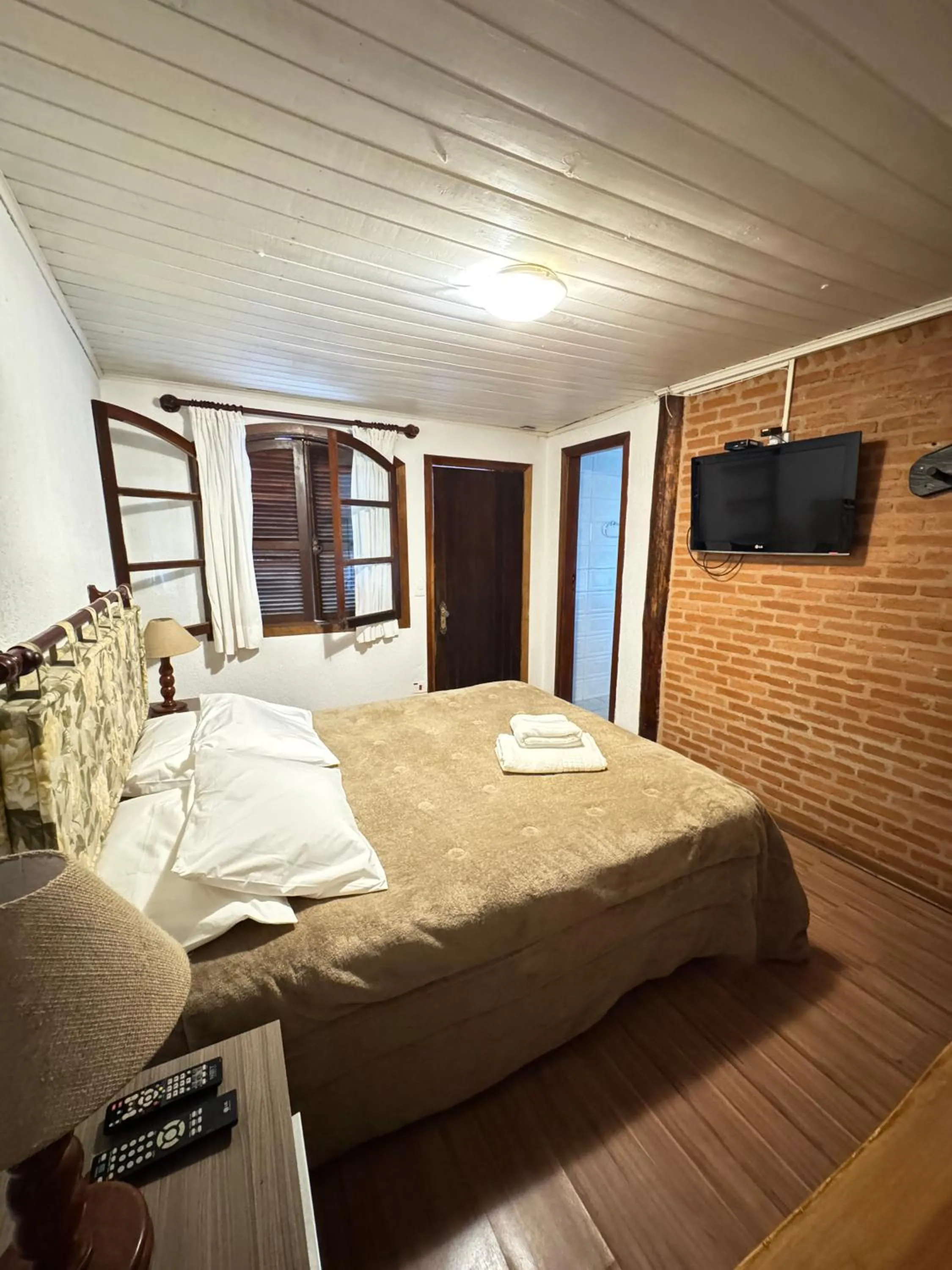 Bed in Pousada do Sino - 2 min do Capivari