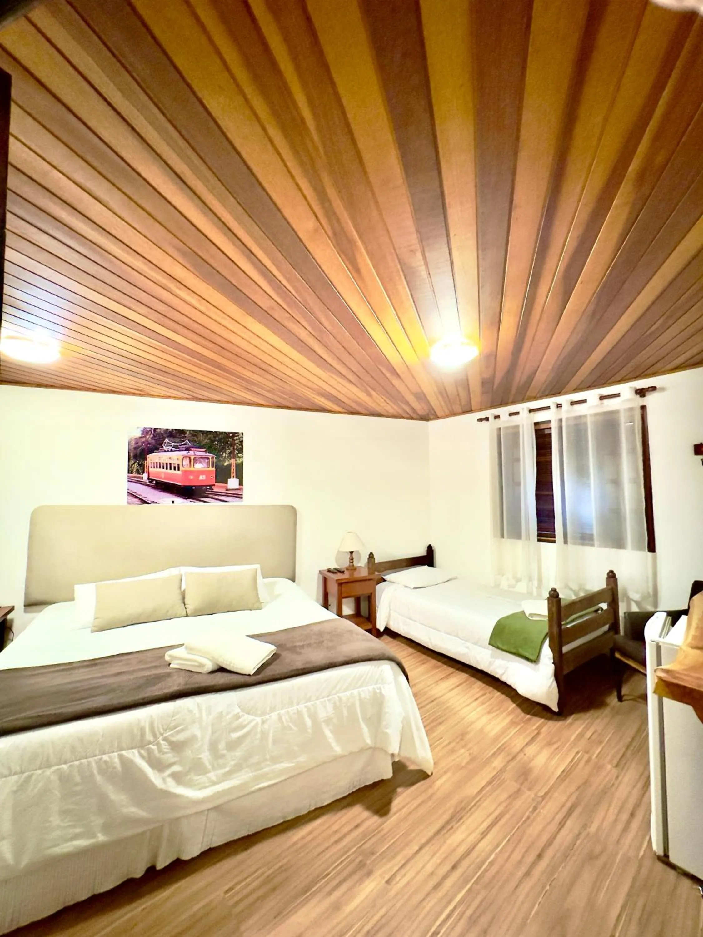 Bed in Pousada do Sino - 2 min do Capivari
