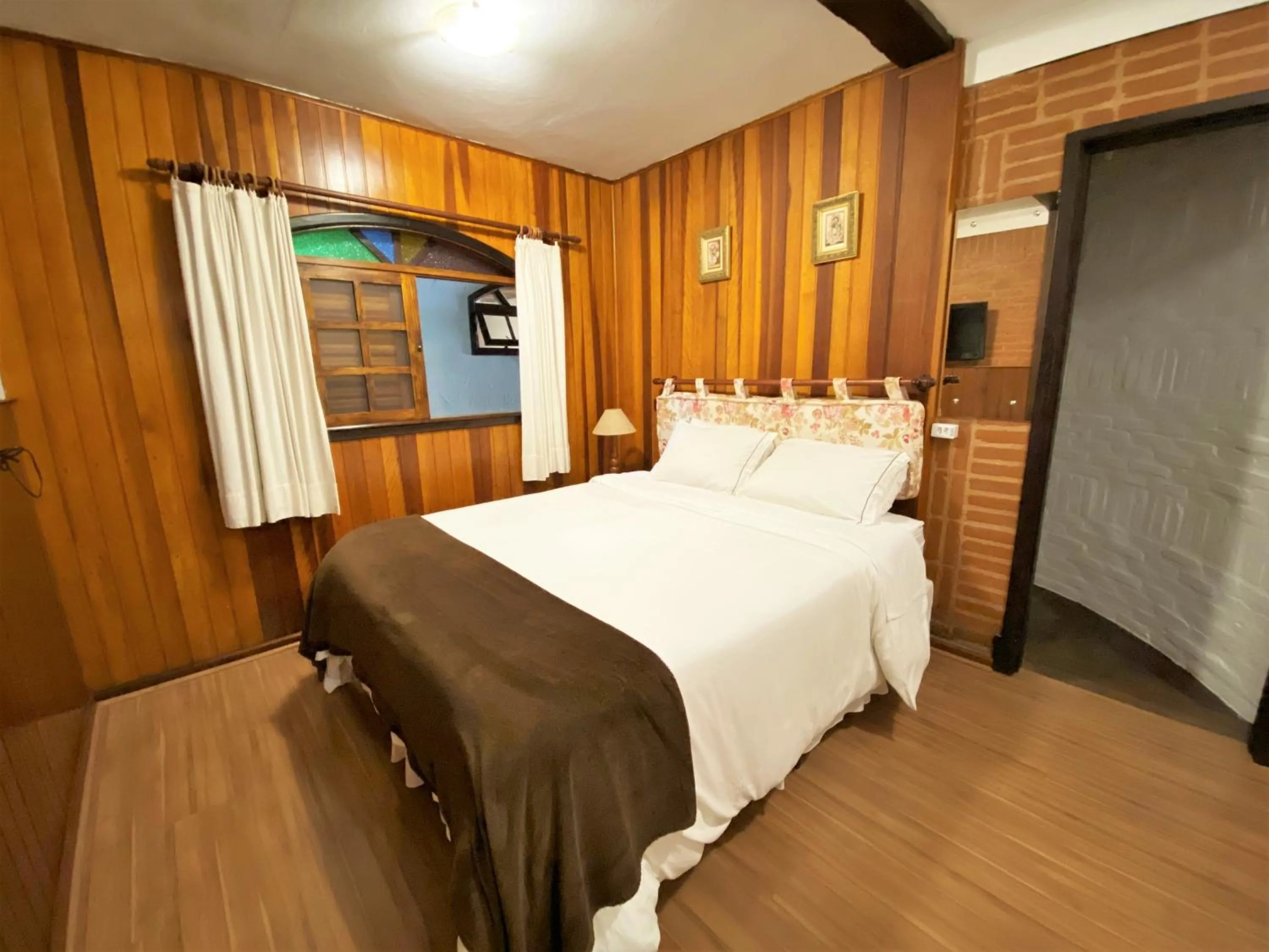 Bed in Pousada do Sino - 2 min do Capivari