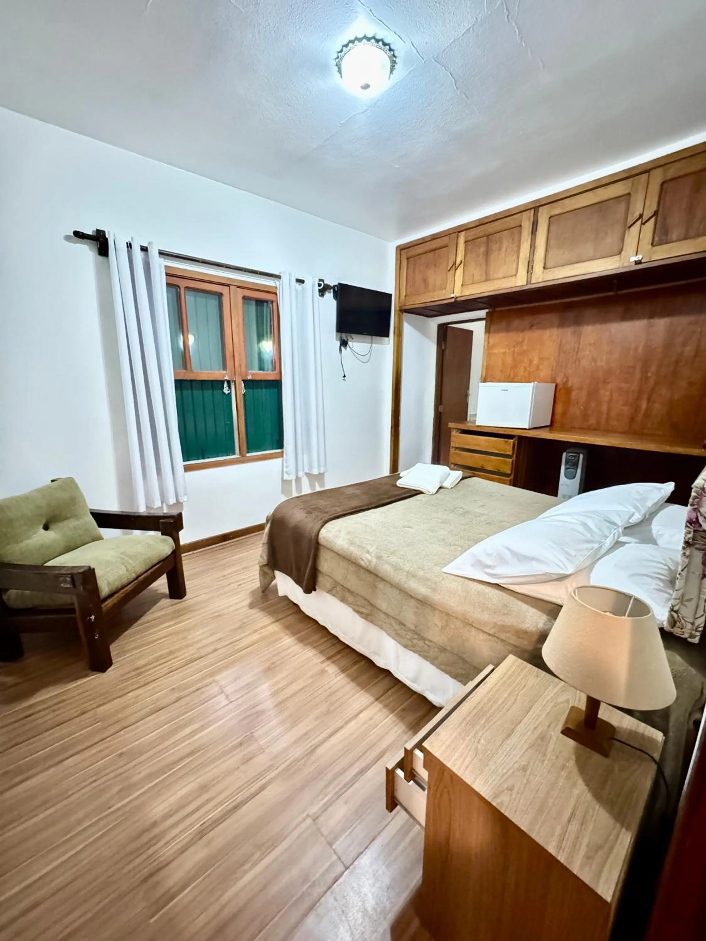 Bed in Pousada do Sino - 2 min do Capivari