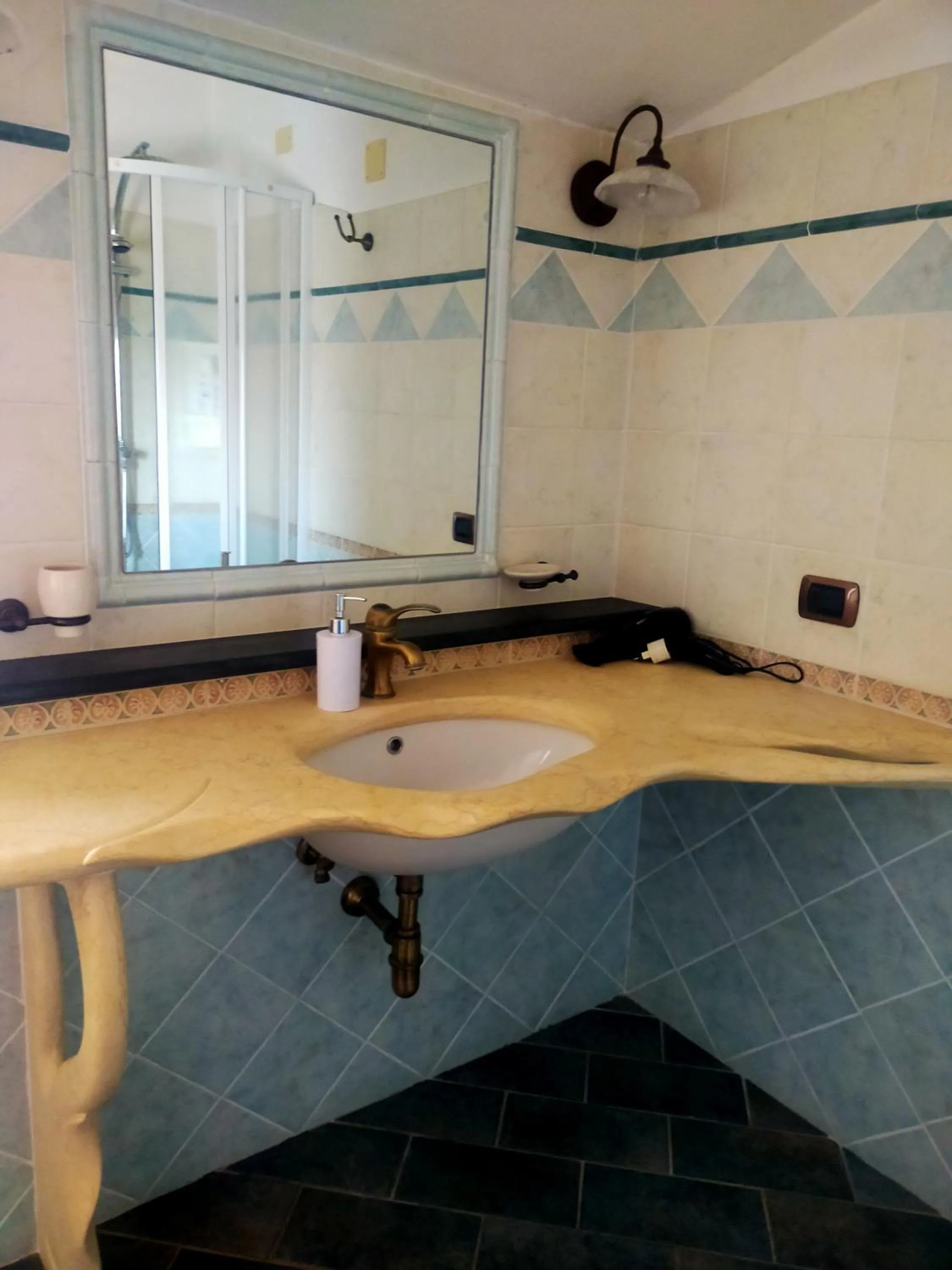 Bathroom in B&B S'arenada