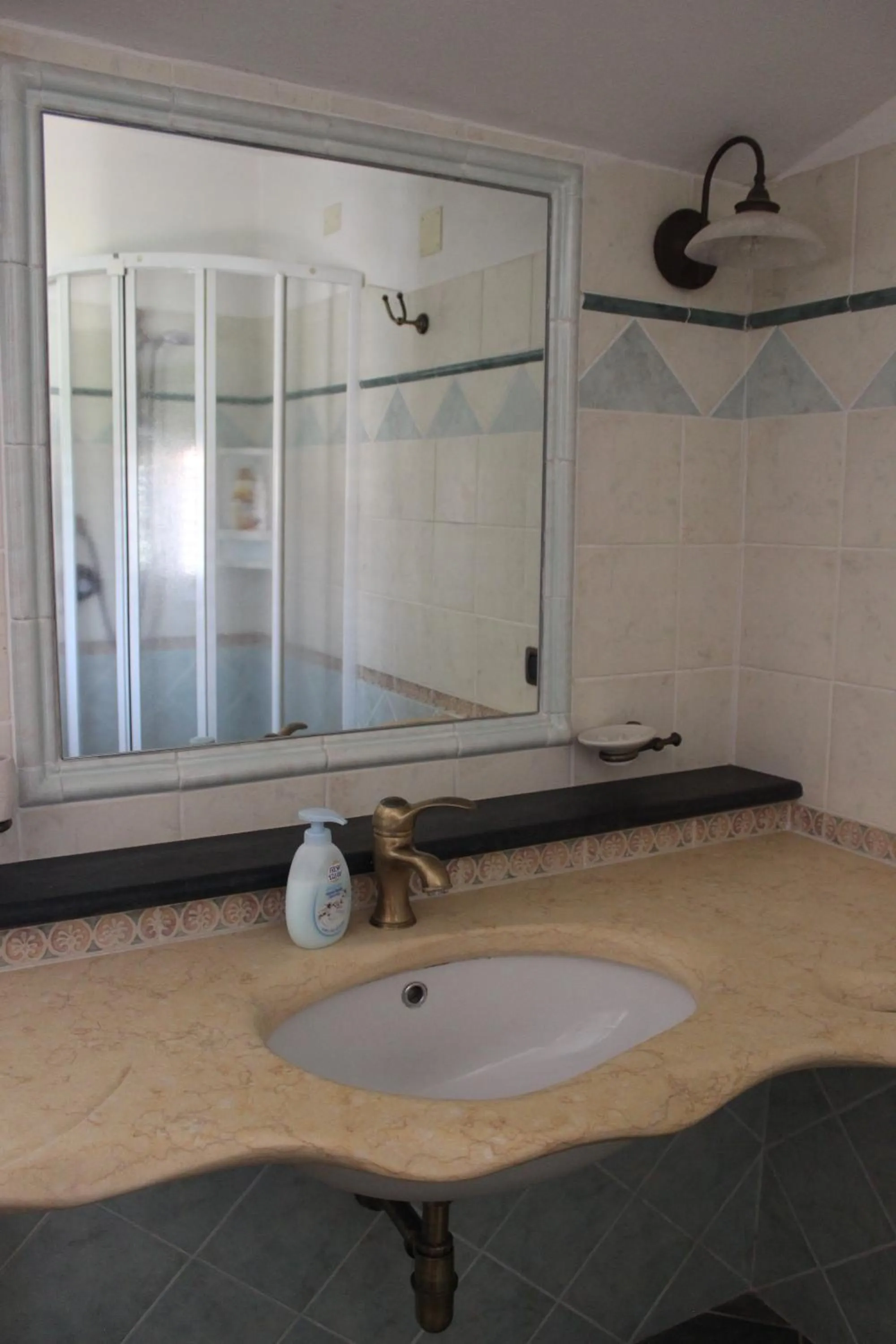 Bathroom in B&B S'arenada