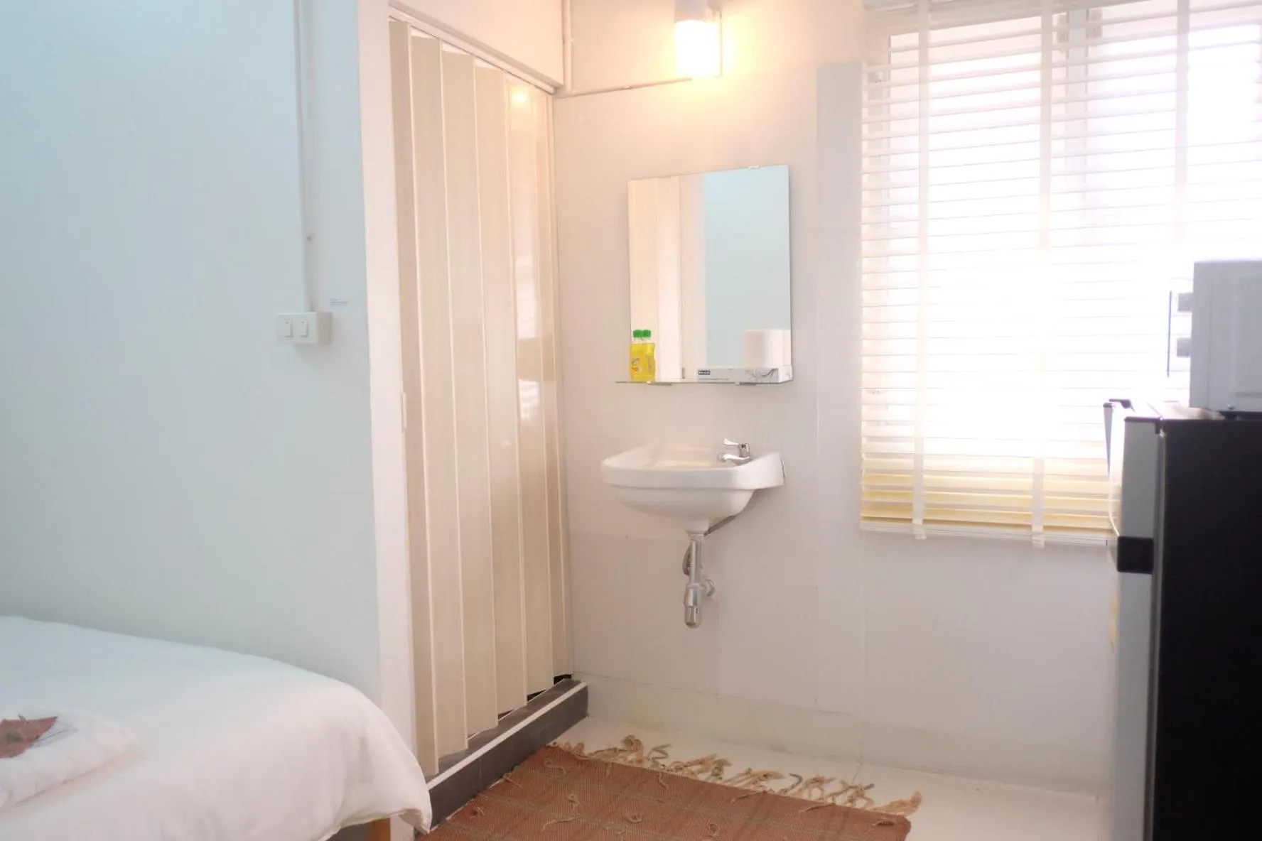 Bed in 12/14 HOME Studio