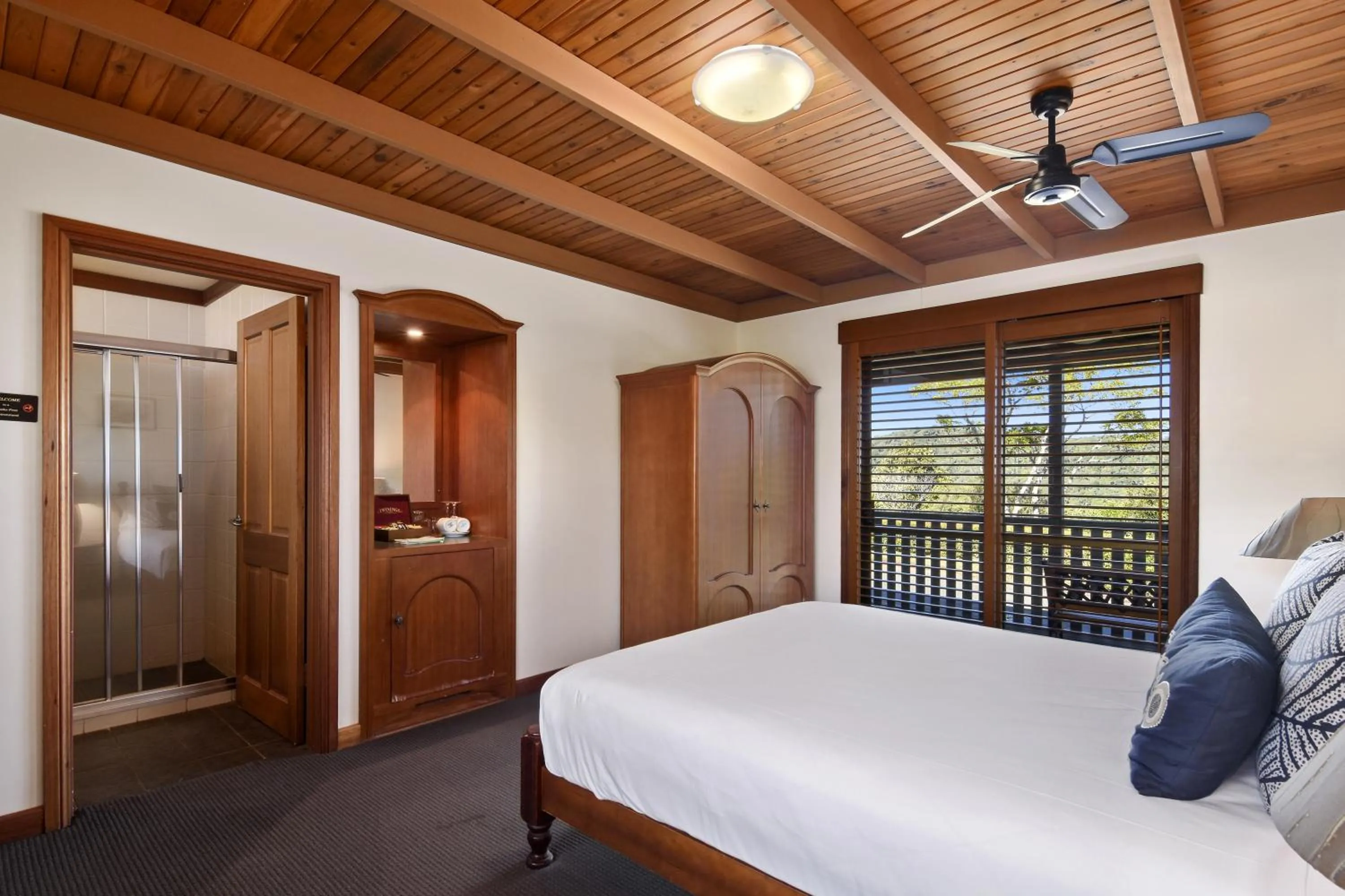 Bed in O'Reilly's Rainforest Retreat