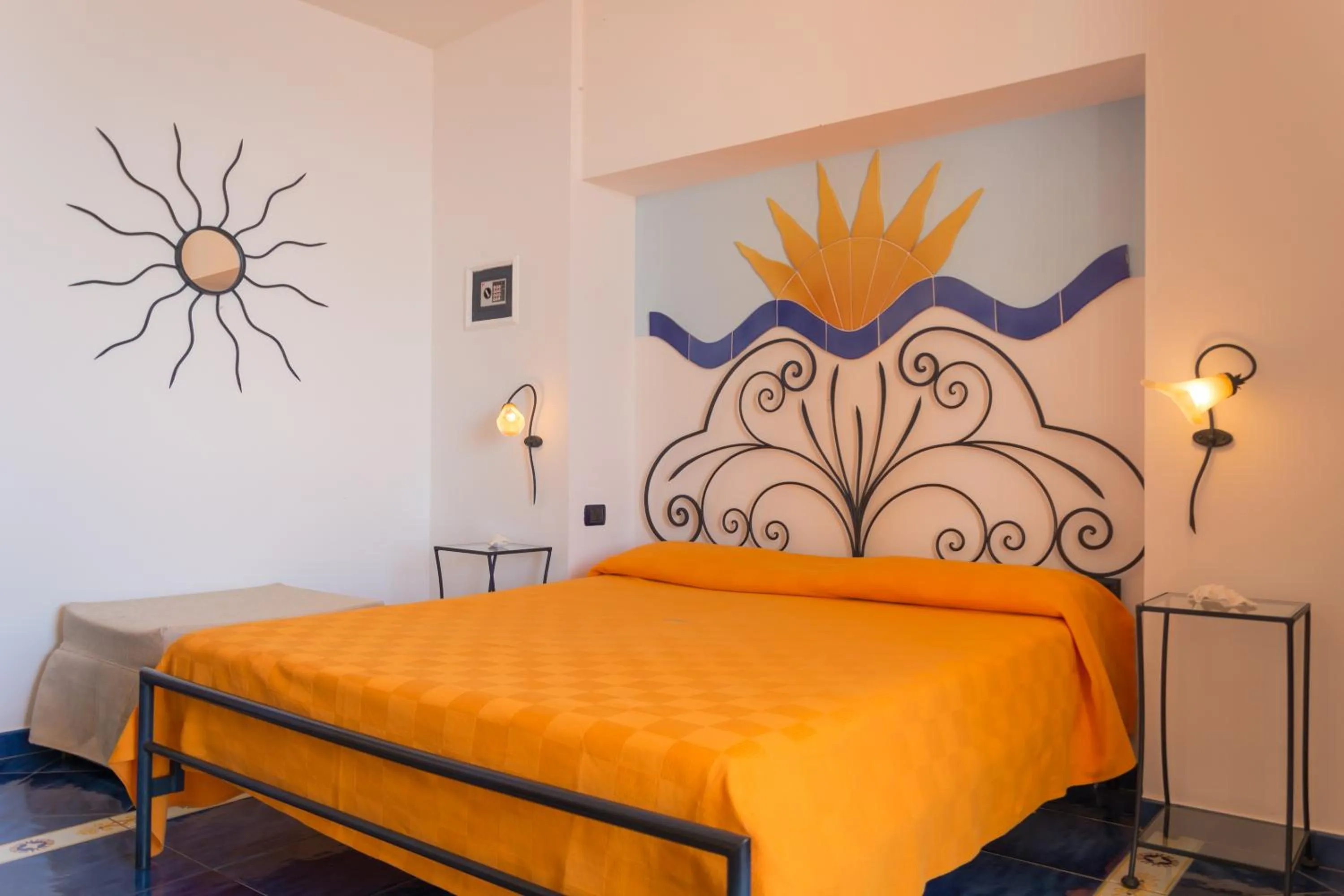 Decorative detail, Bed in Palazzo Cocò Sentiero dei Limoni