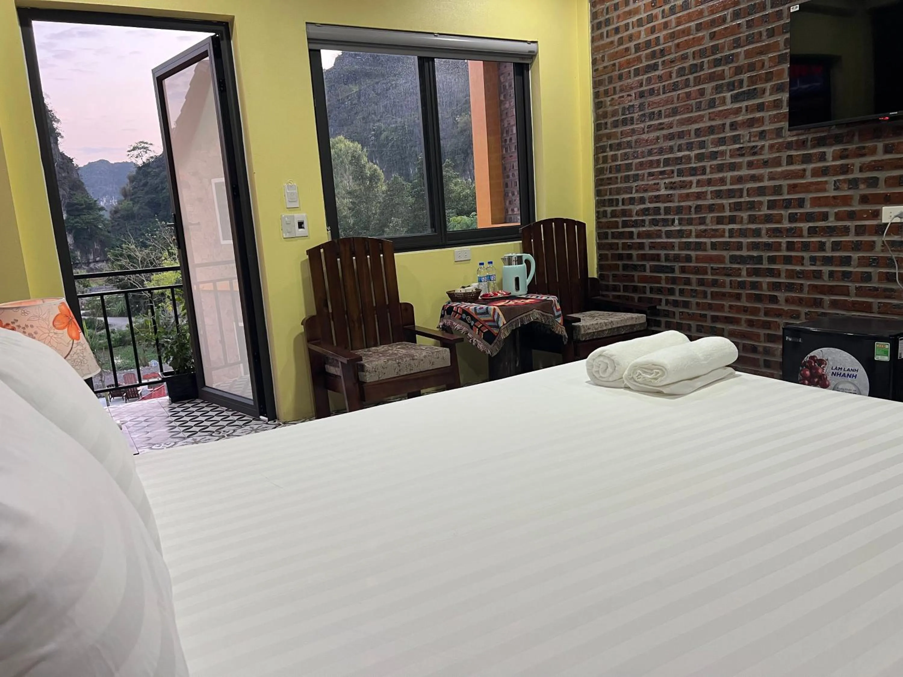 Bed in Cozy Son Hotel