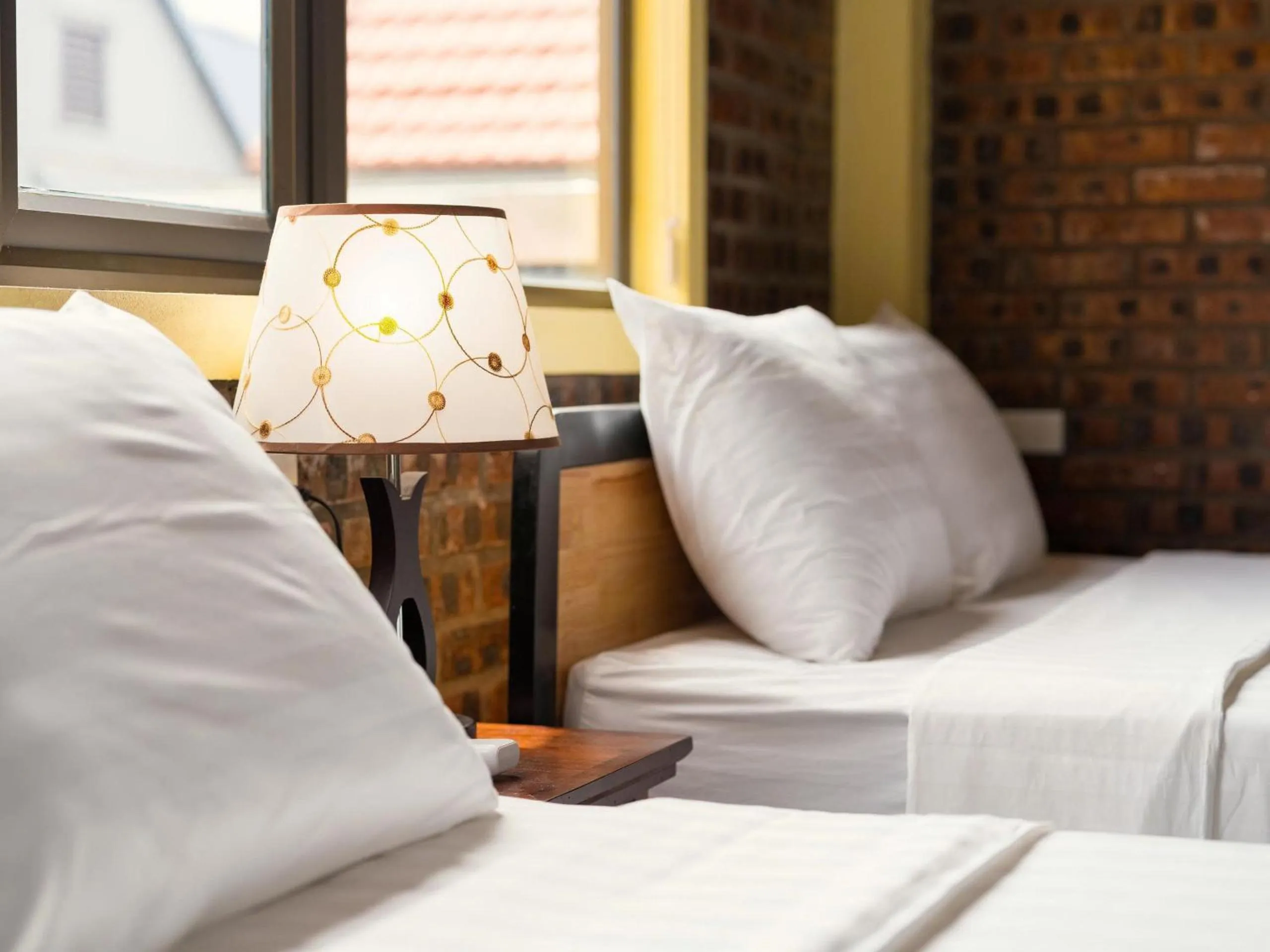 Bed in Cozy Son Hotel