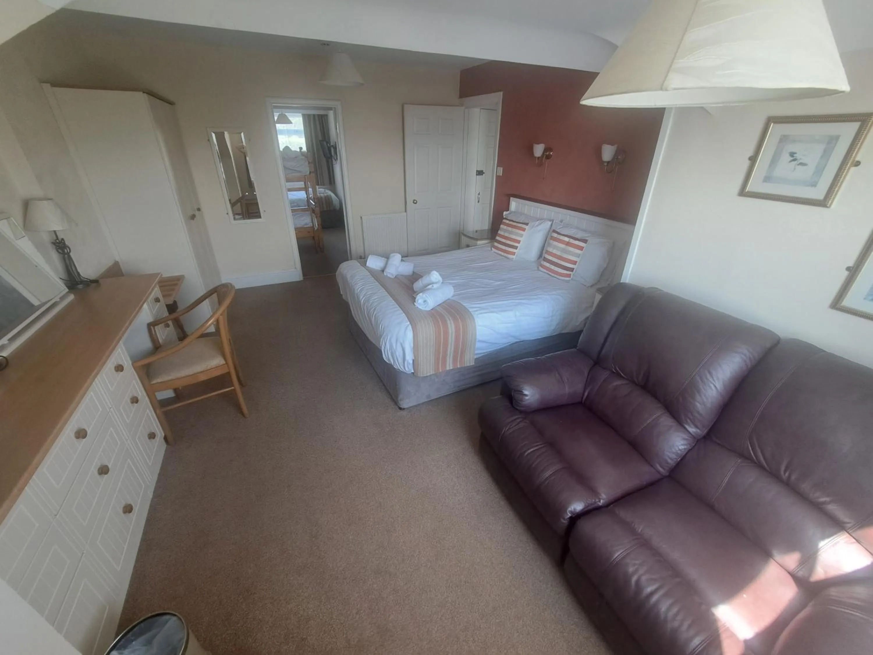 Bed in Lion Hotel & Studio Apartments