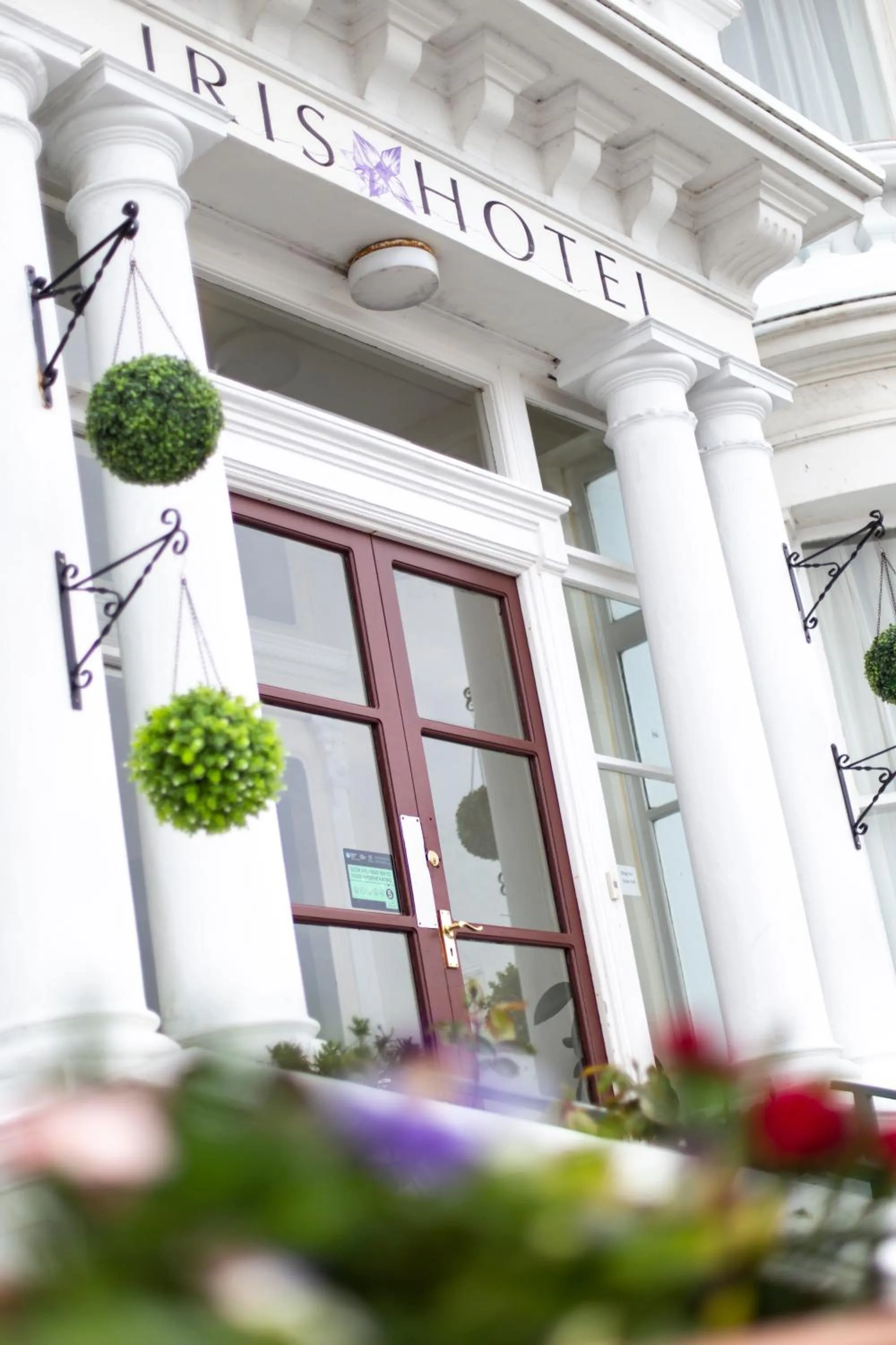 Property logo or sign in Iris Hotel Llandudno