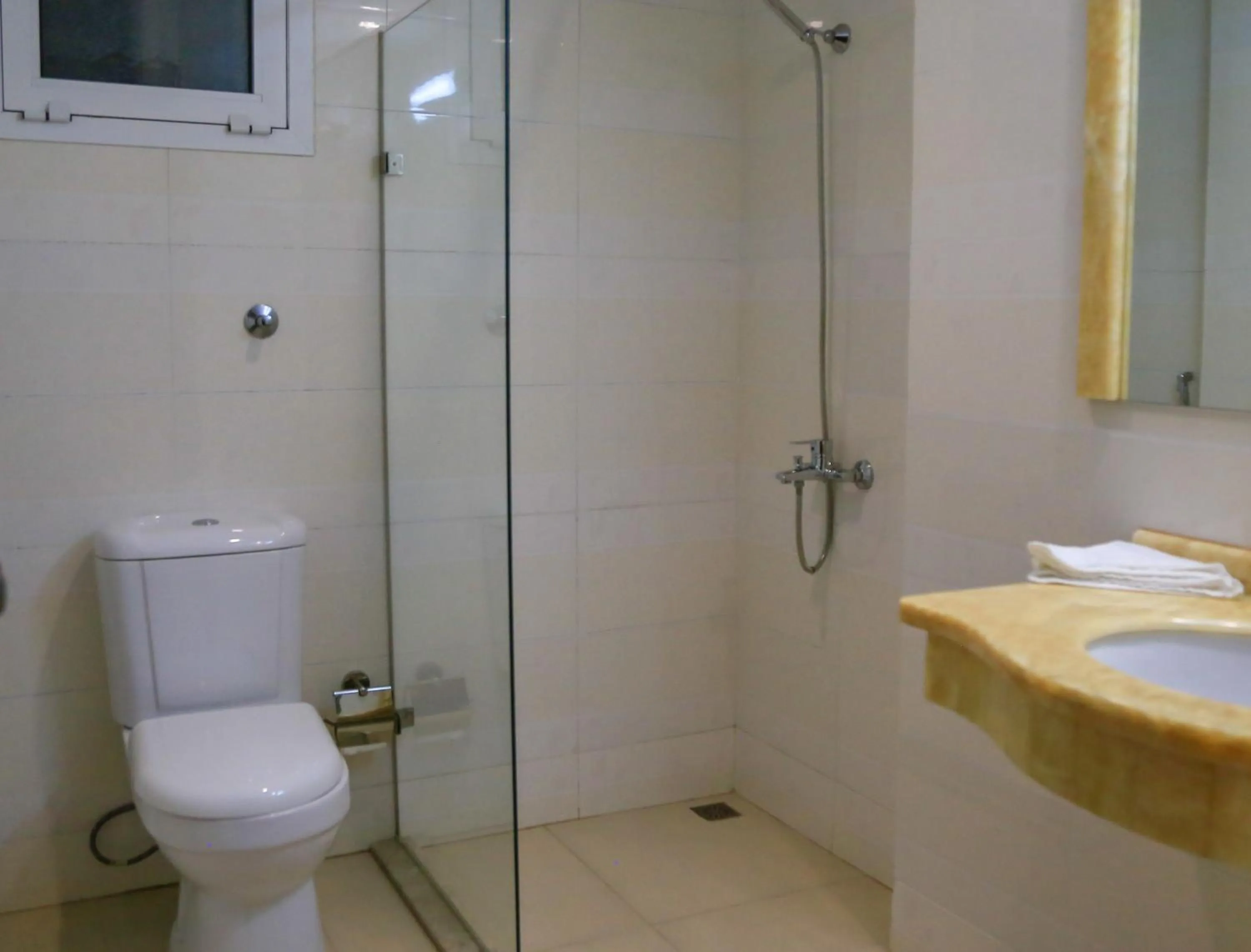 Bathroom in Muscat Inn Hotel