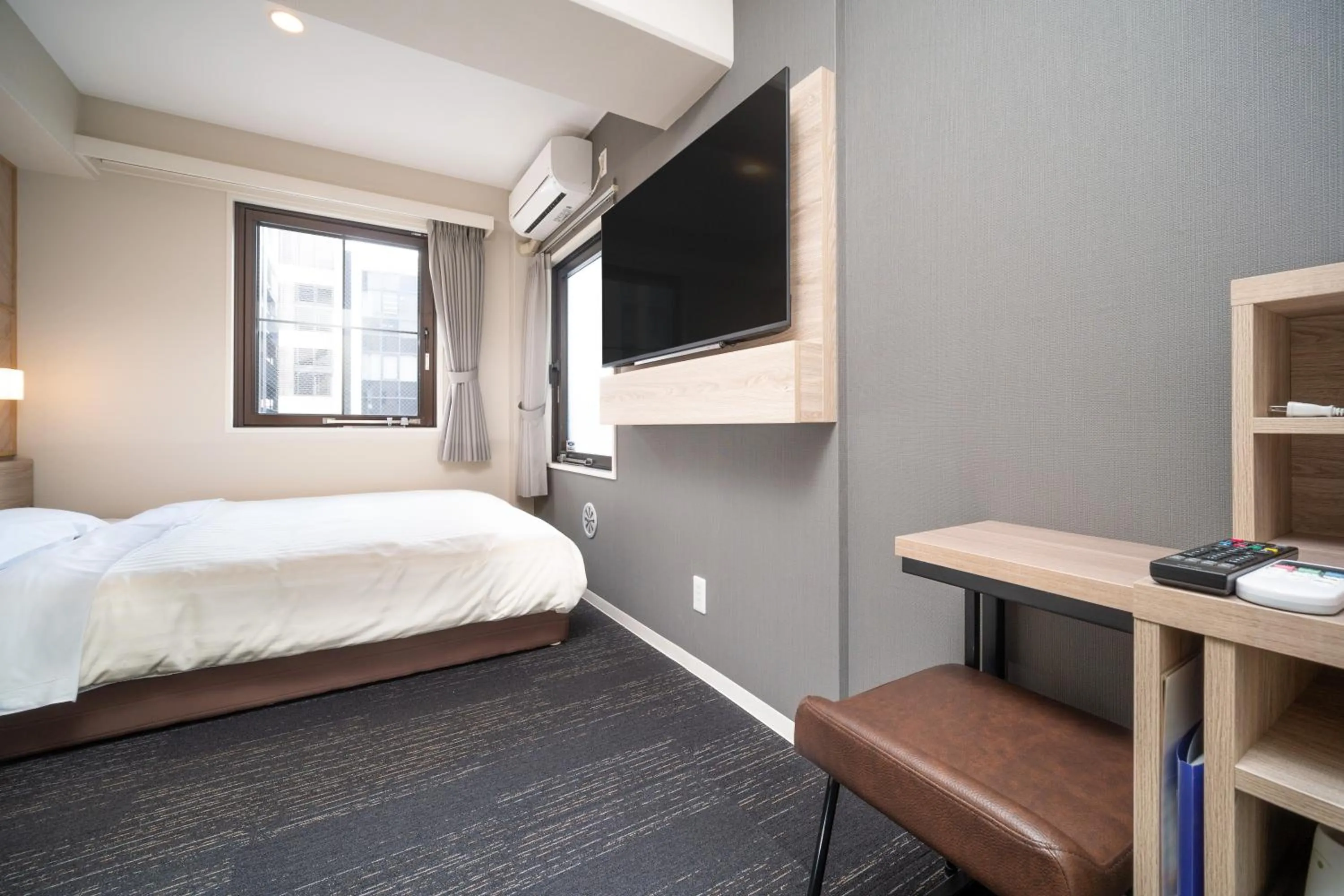 Bed in Super Hotel Kobe