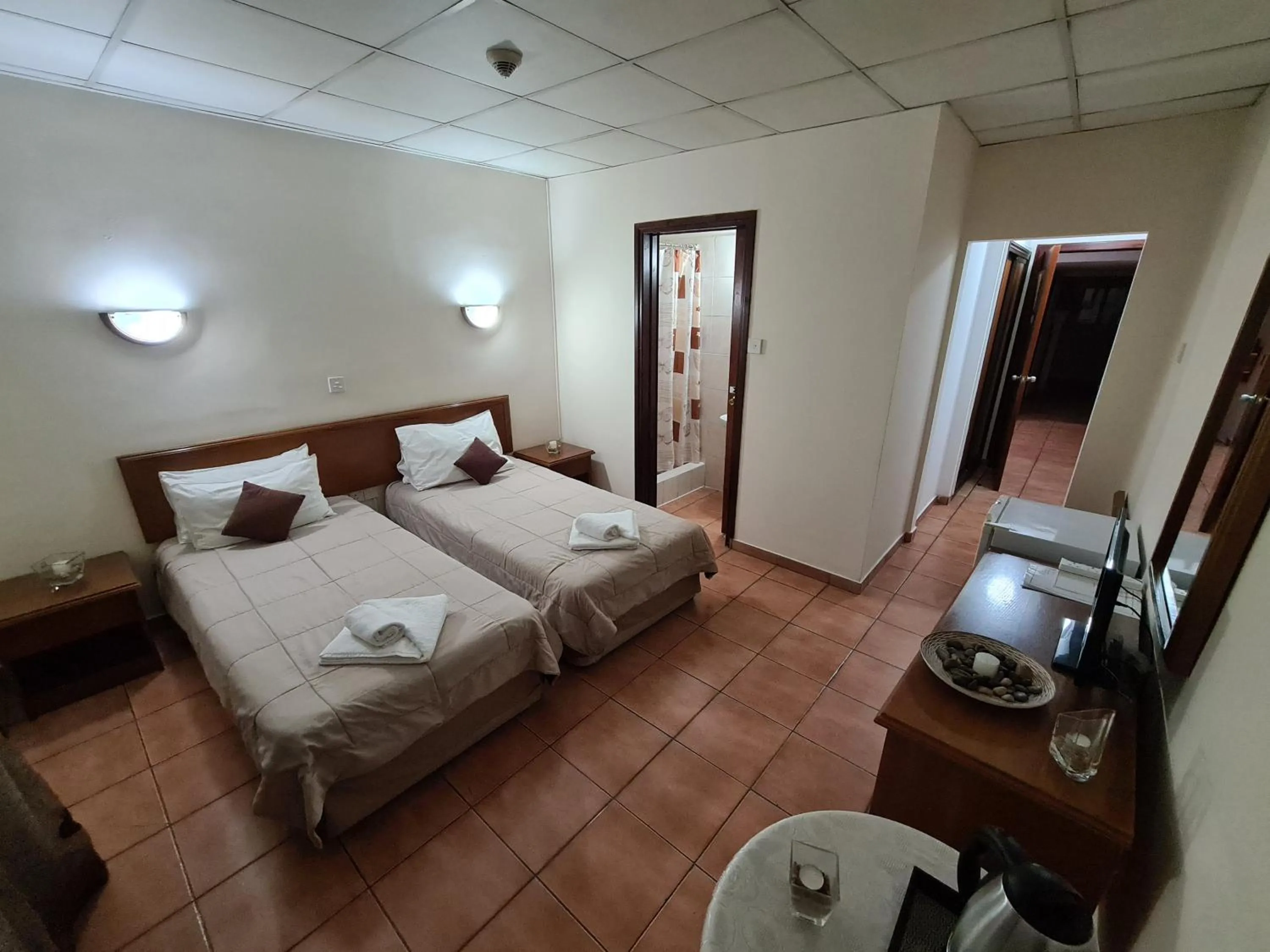 Bed in Metropole Hotel