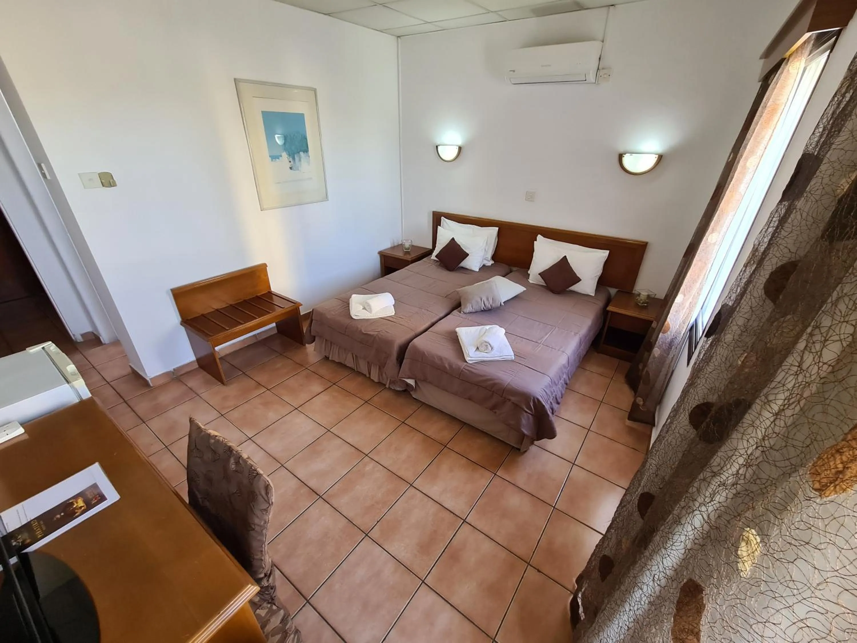 Bed in Metropole Hotel