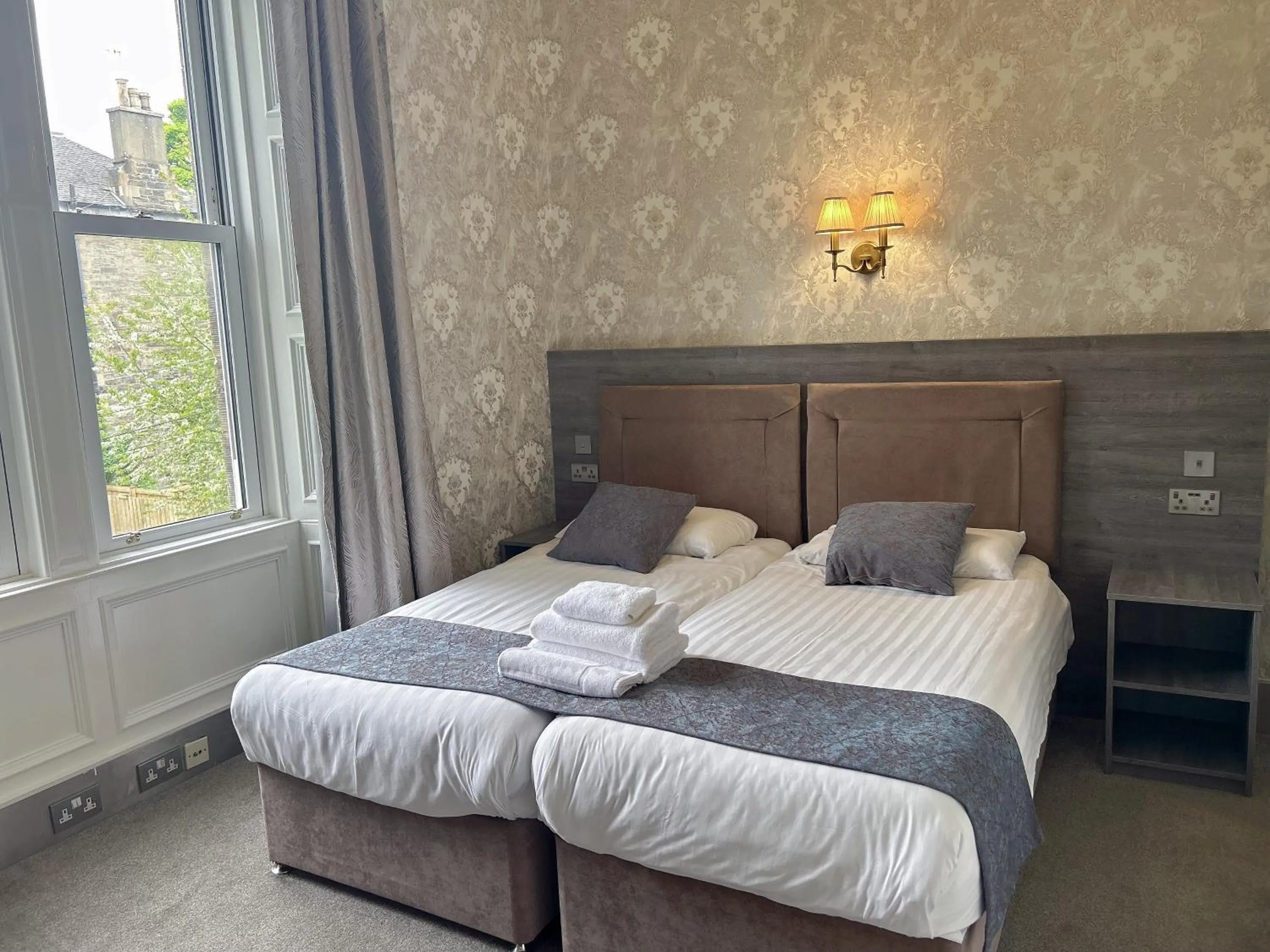 Bed in Alexander Guest House