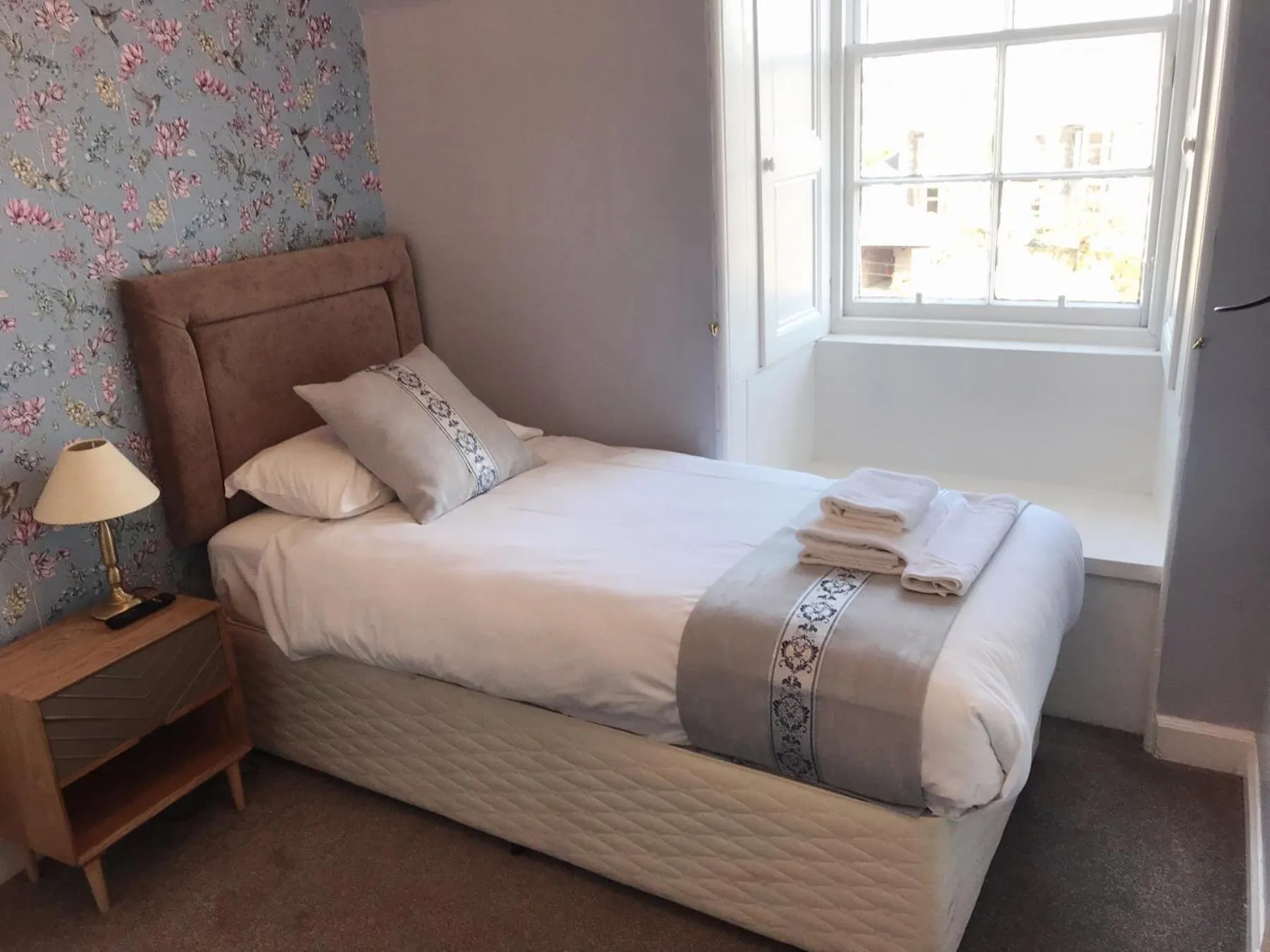 Bed in Alexander Guest House