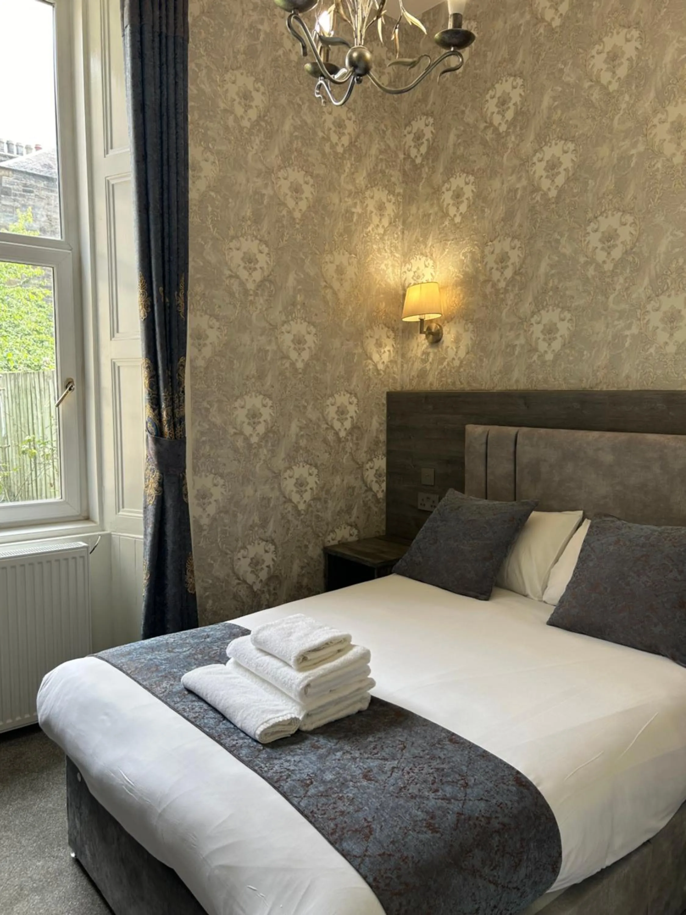 Bed in Alexander Guest House