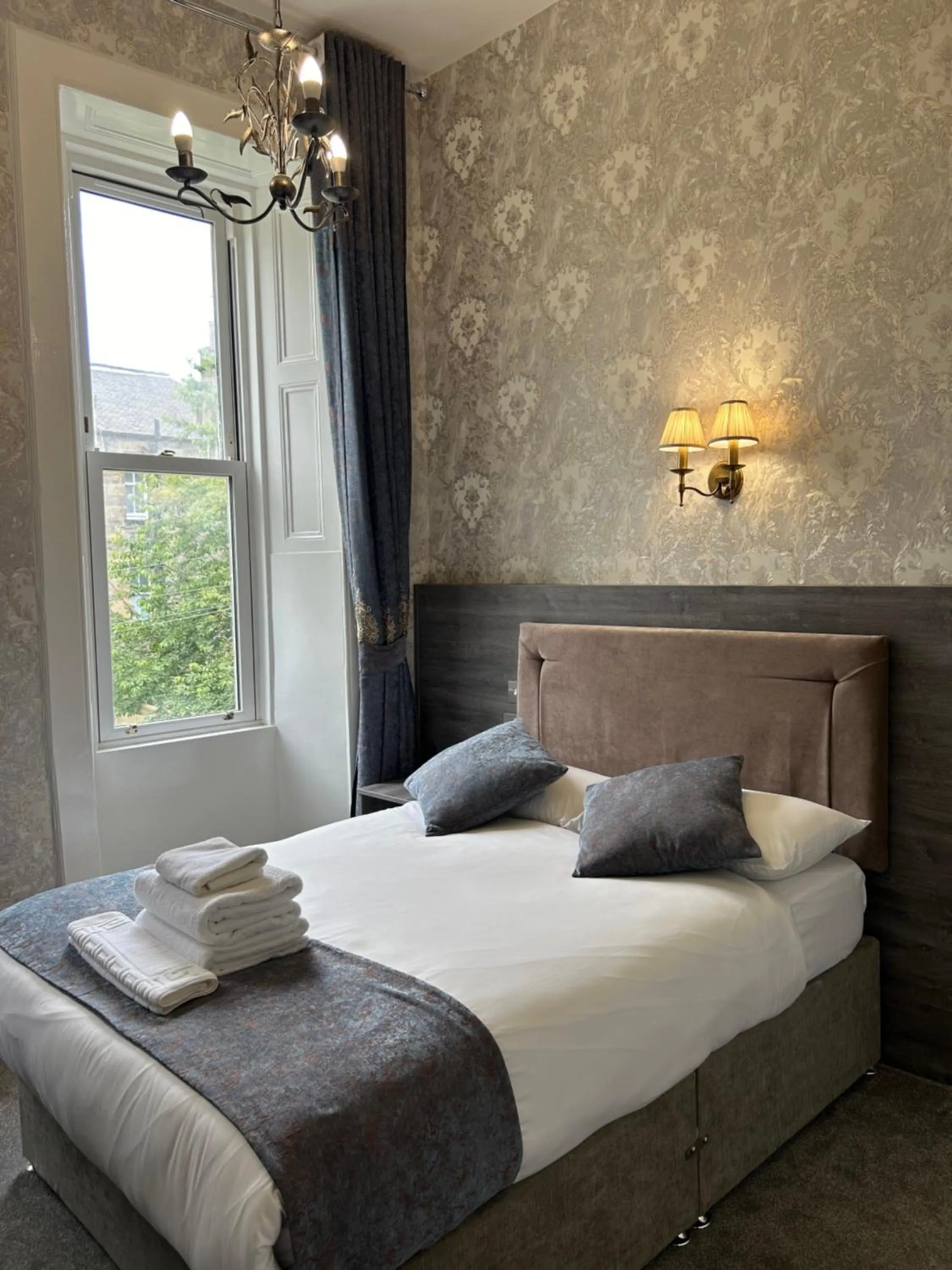 Bed in Alexander Guest House