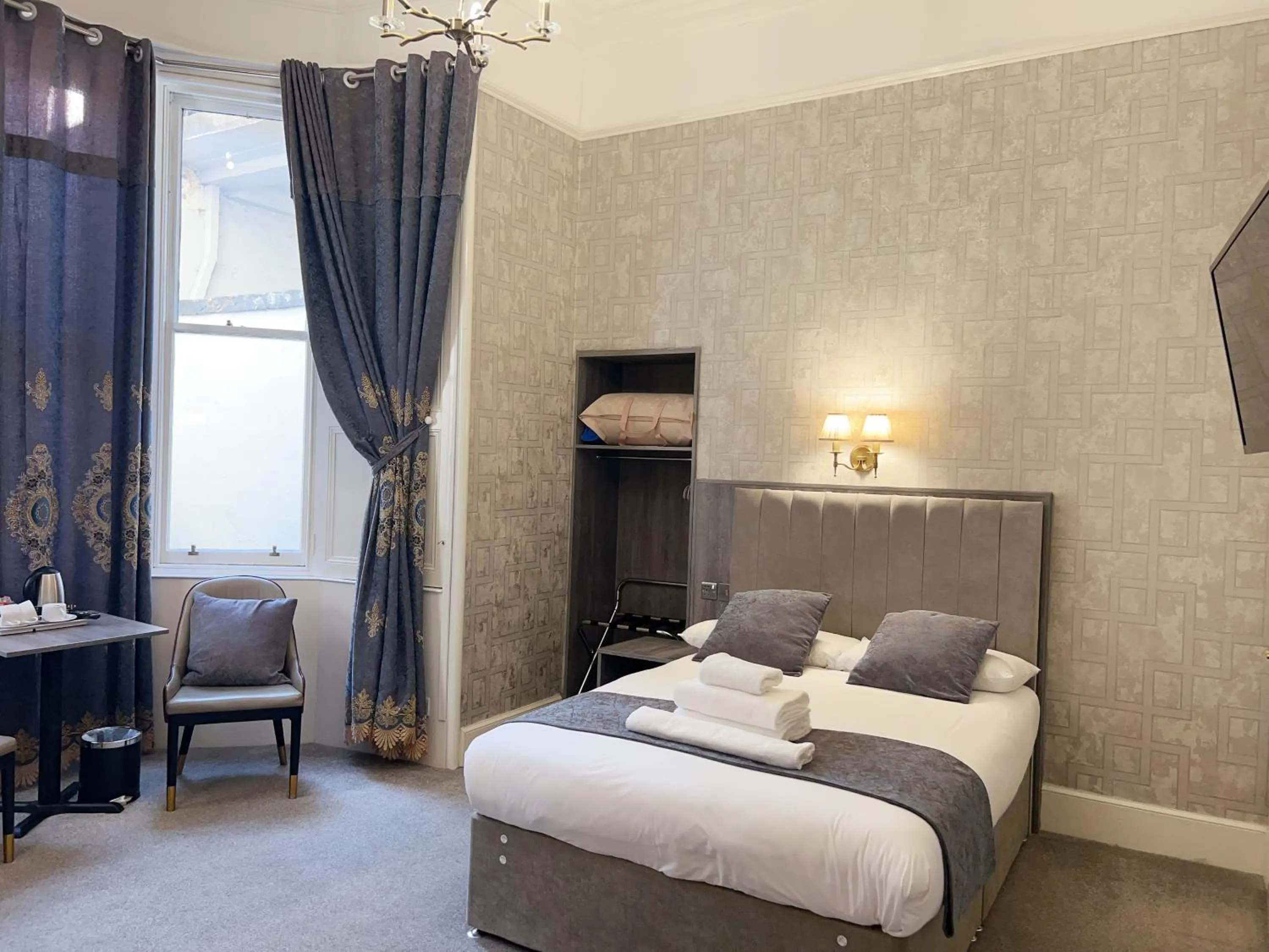 Bed in Alexander Guest House