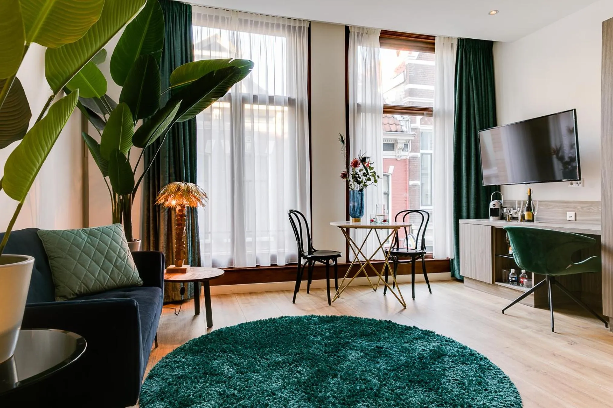 Seating area in Brasss Hotel Suites