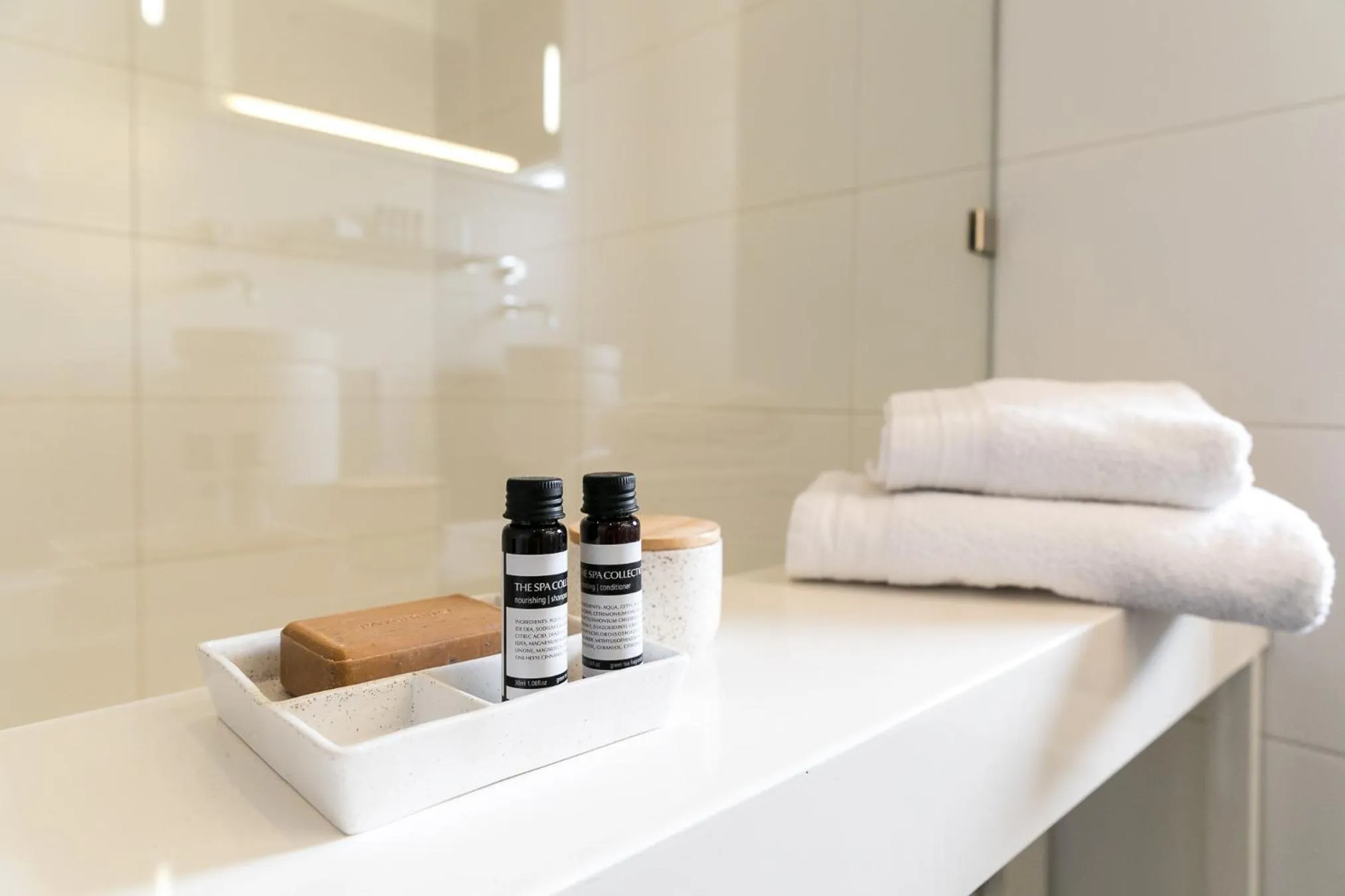 Bathroom in Brasss Hotel Suites